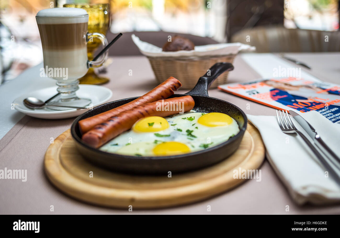scrambled eggs with sausages Stock Photo - Alamy