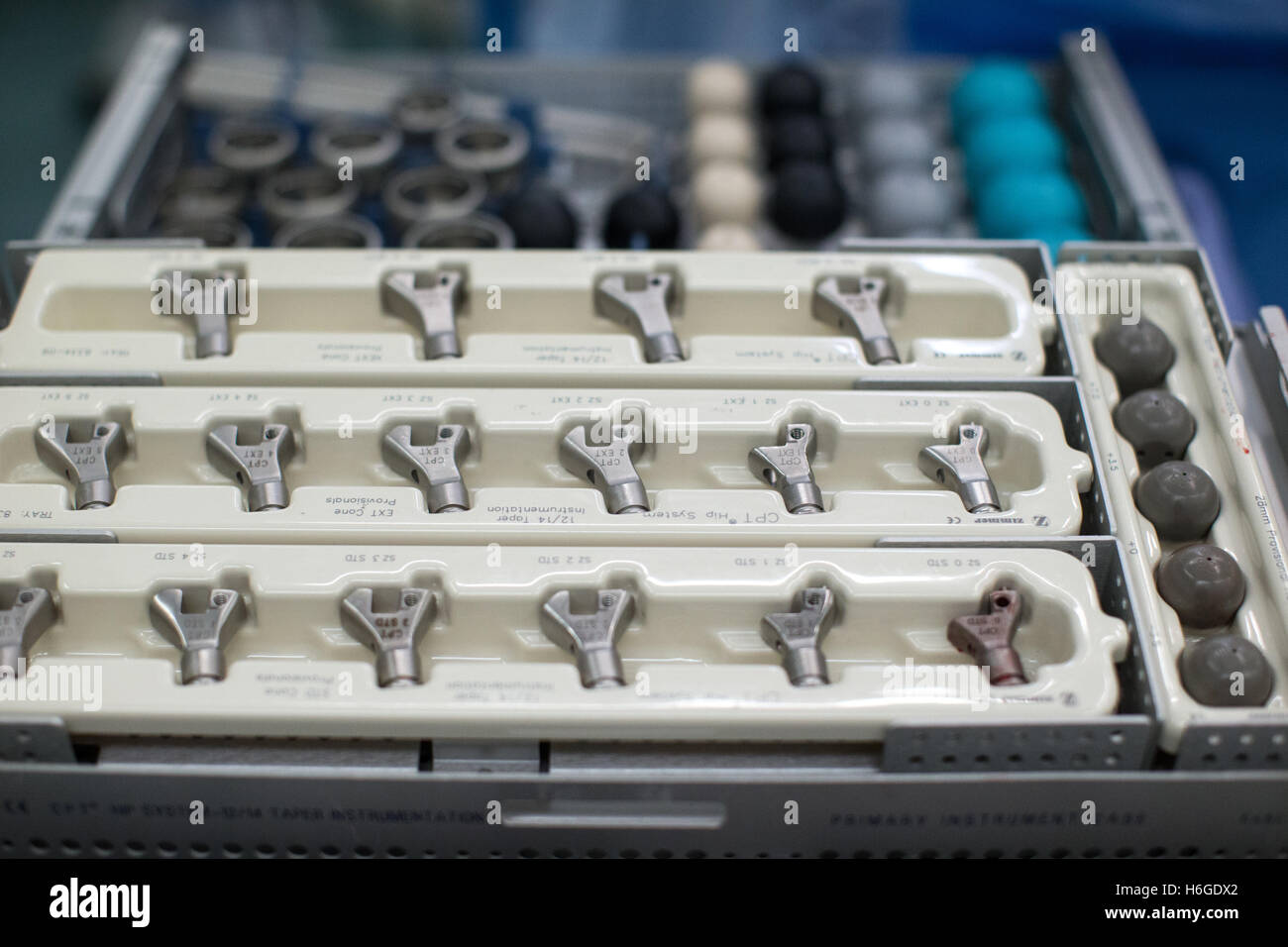 Drill bits and equipment for orthopedic surgery used in knee replacement surgery ready for use in a hospital theatre Stock Photo