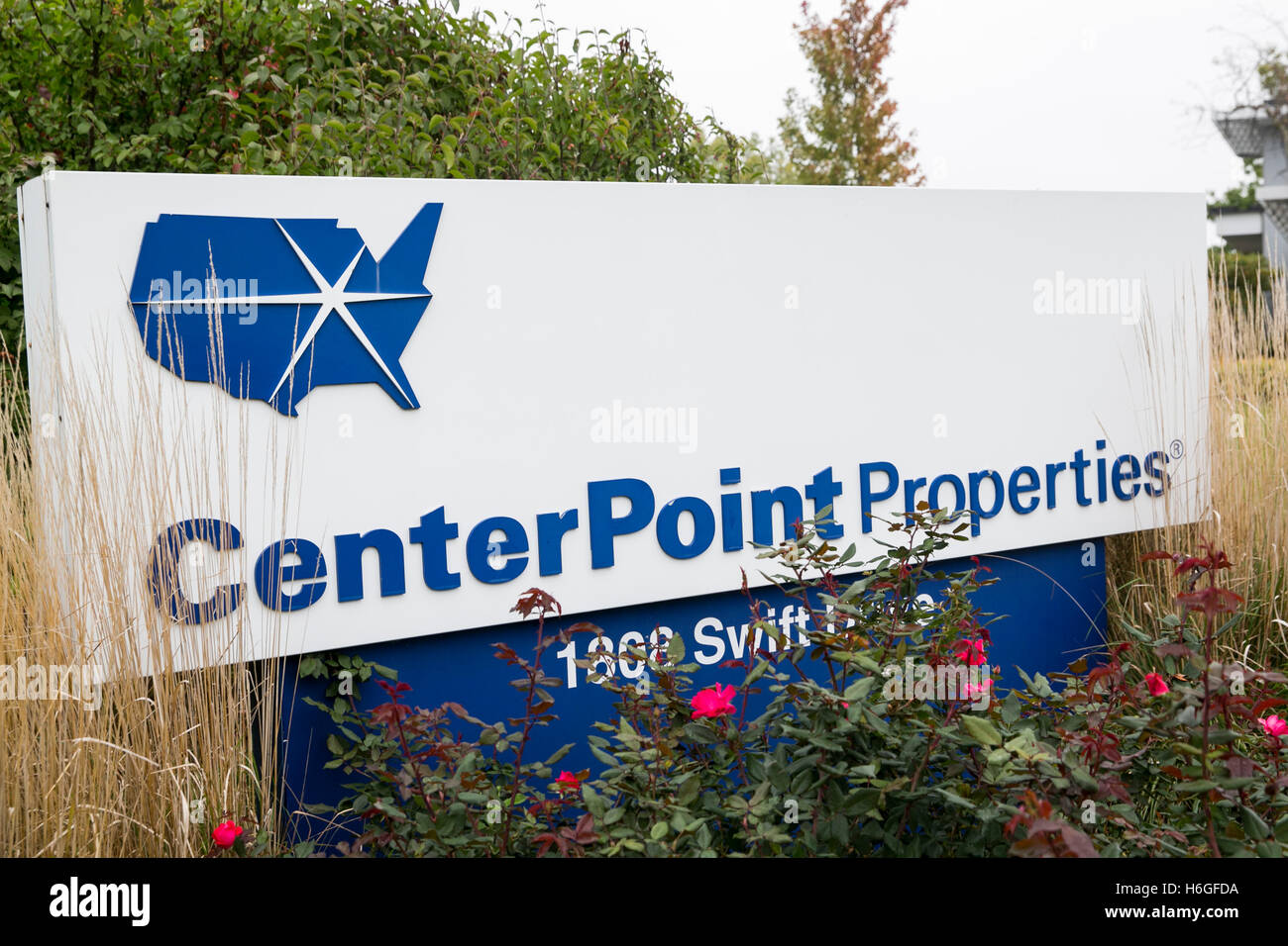 A logo sign outside of the headquarters of CenterPoint Properties in Oak Brook, Illinois on