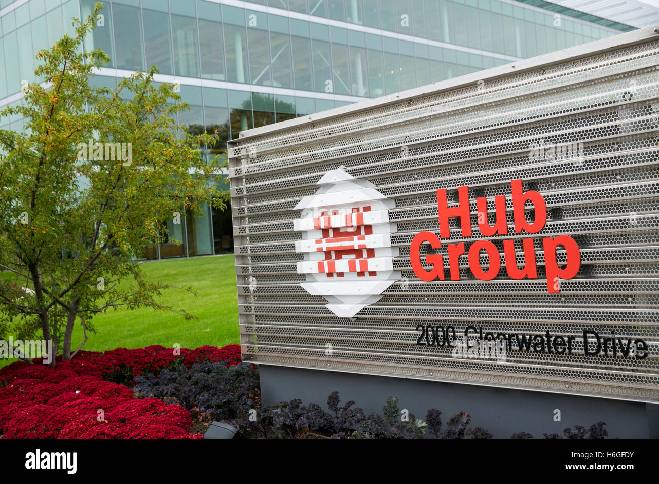 A logo sign outside of the headquarters of The Hub Group in Oak Brook
