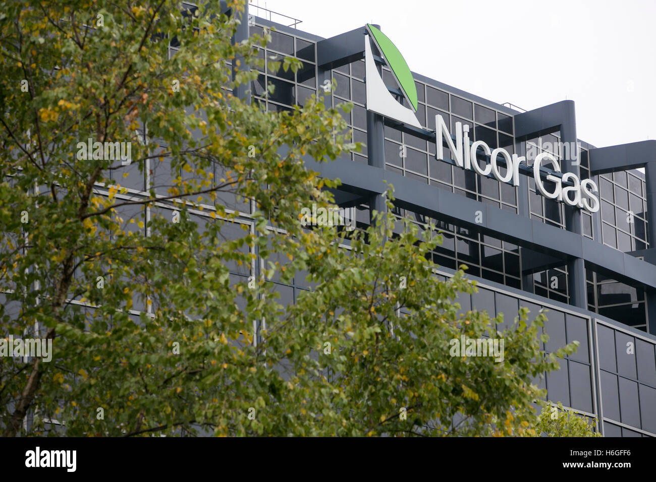 A logo sign outside of the headquarters of Nicor Gas in Naperville, Illinois on October 15, 2016. Stock Photo