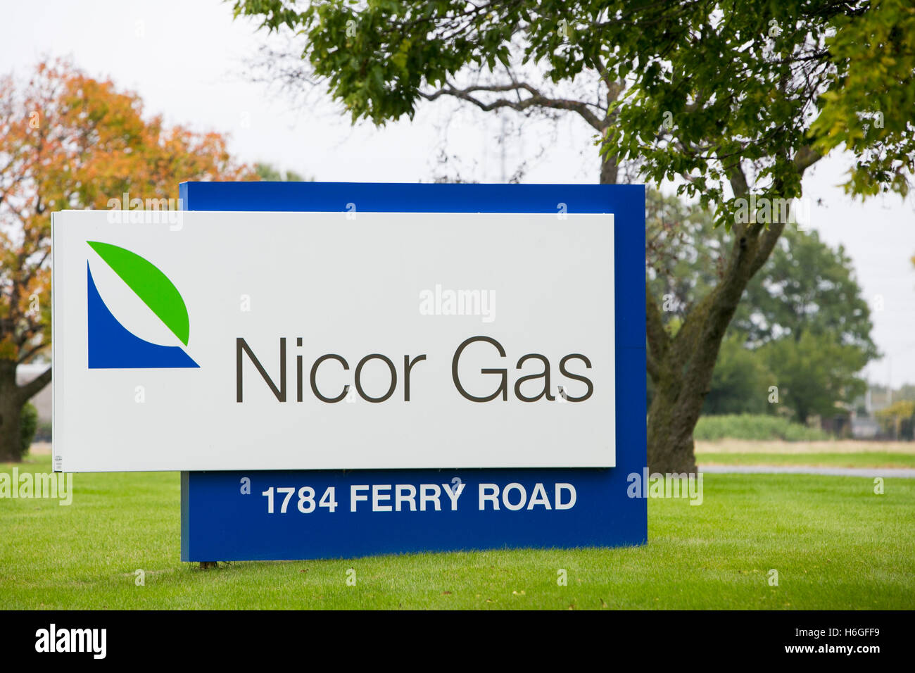 A logo sign outside of the headquarters of Nicor Gas in Naperville