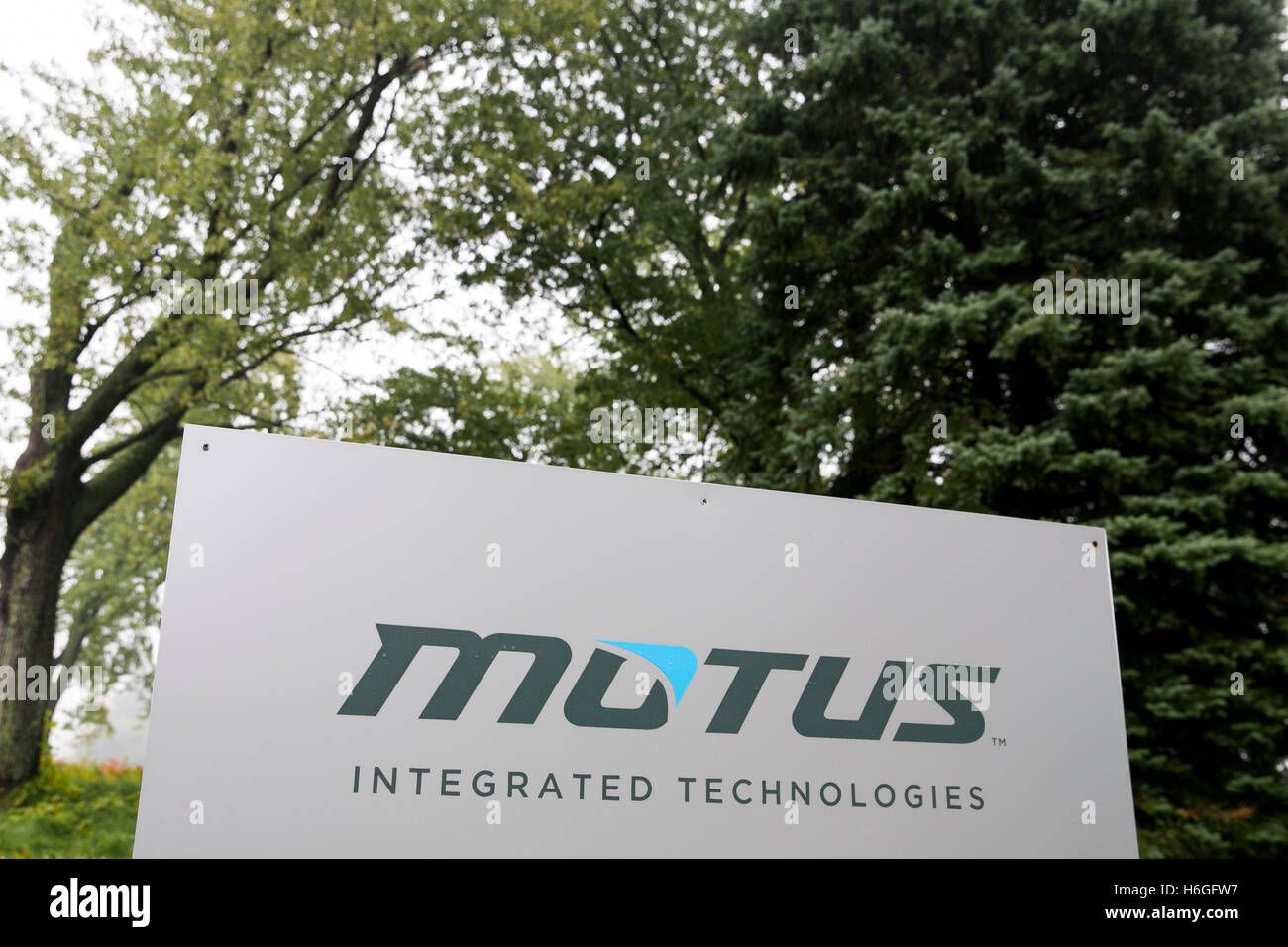 A logo sign outside of the headquarters of Motus Integrated