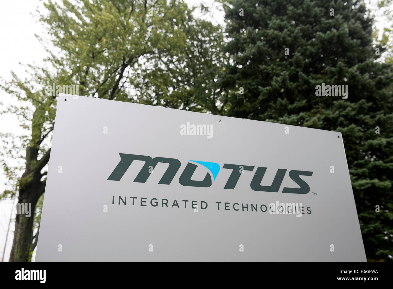 A logo sign outside of the headquarters of Motus Integrated