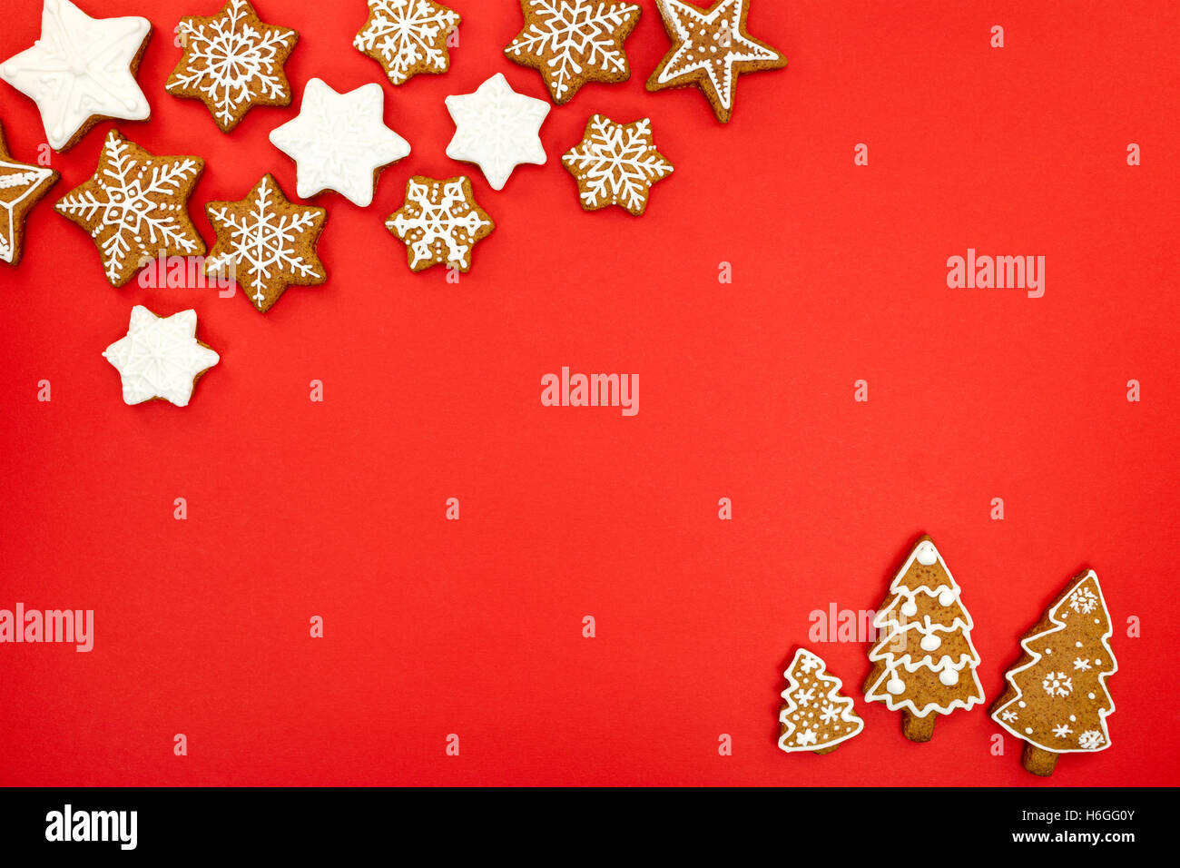 red background with fir trees and snowflakes shaped christmas ...