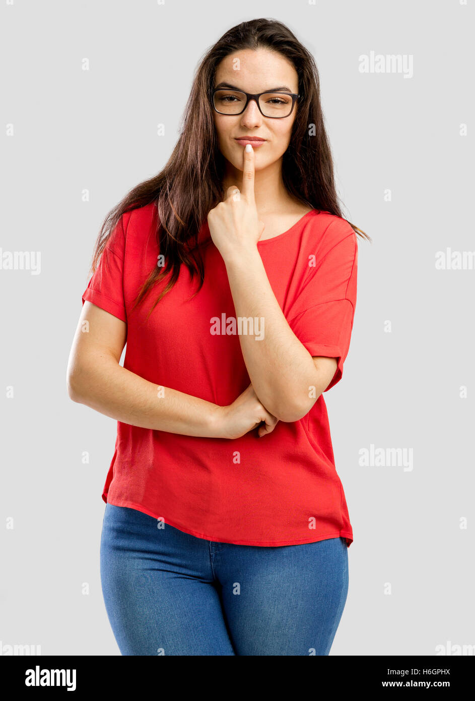 Beautiful and lovely woman making a thinking expression Stock Photo