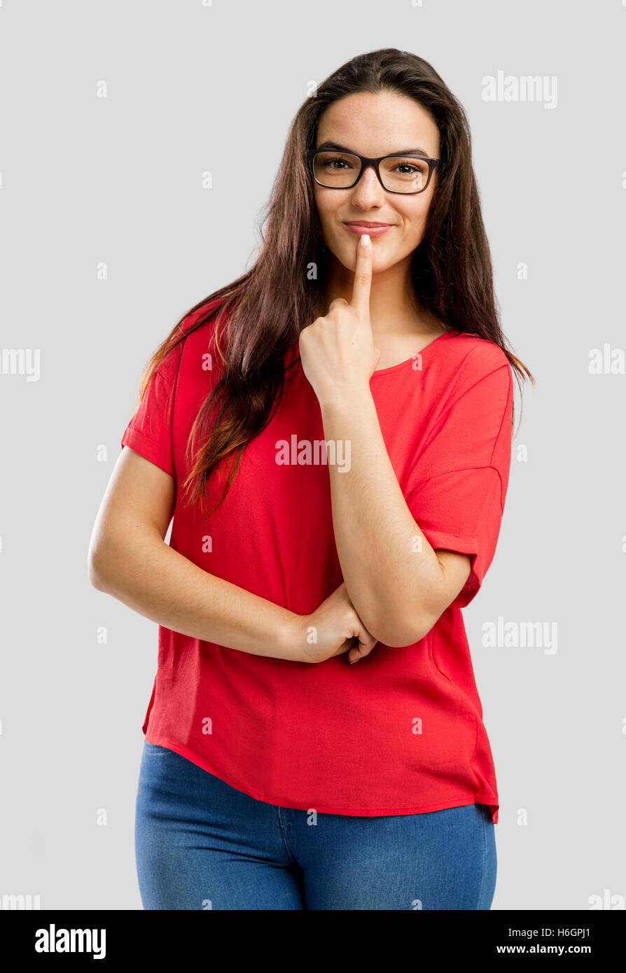 Beautiful and lovely woman making a thinking expression Stock Photo