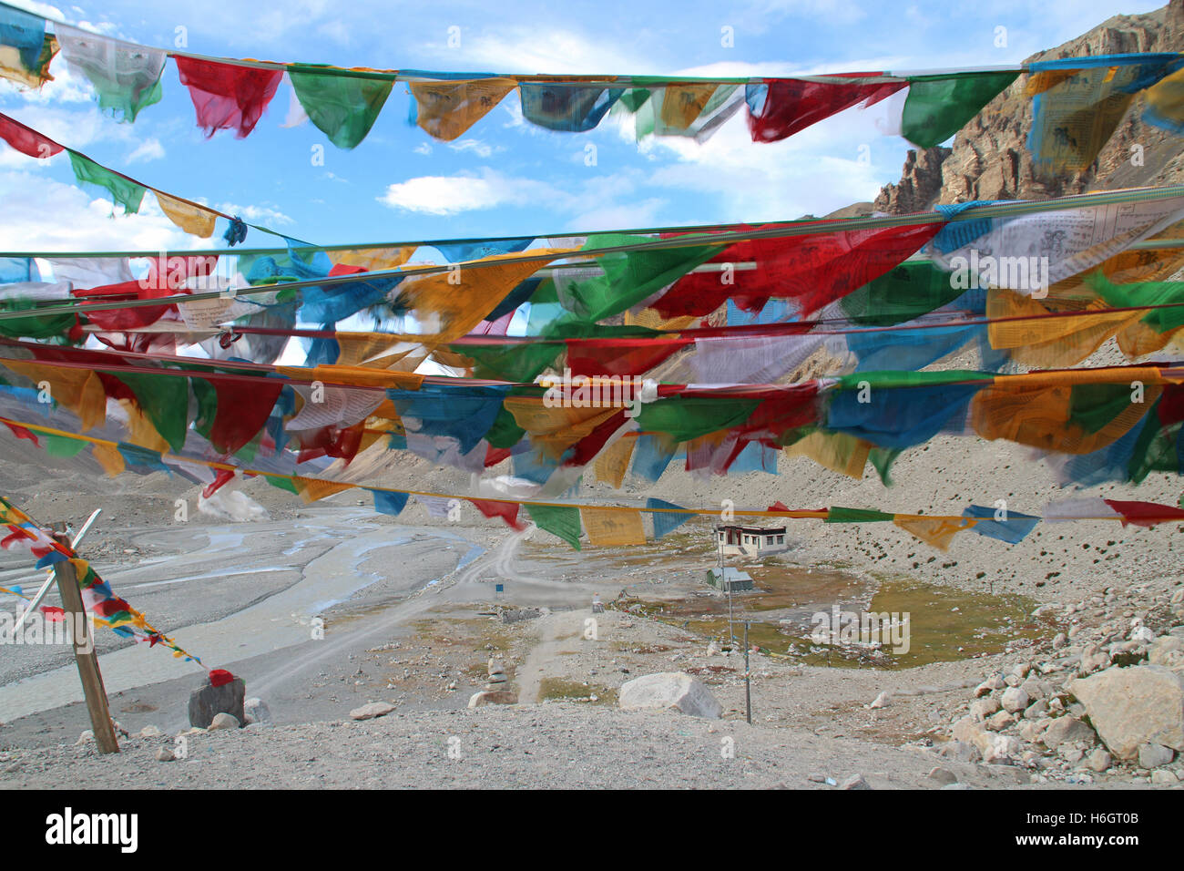View of mountains with the sutra streamers from Everest Base Camp, Tibet Stock Photo