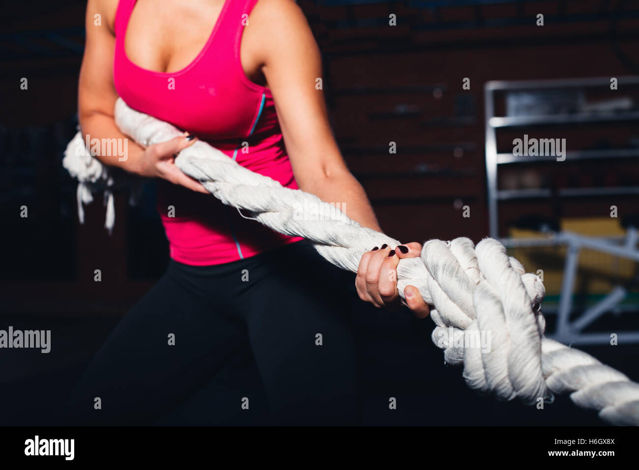 Girl pulling rope Stock Photo Alamy