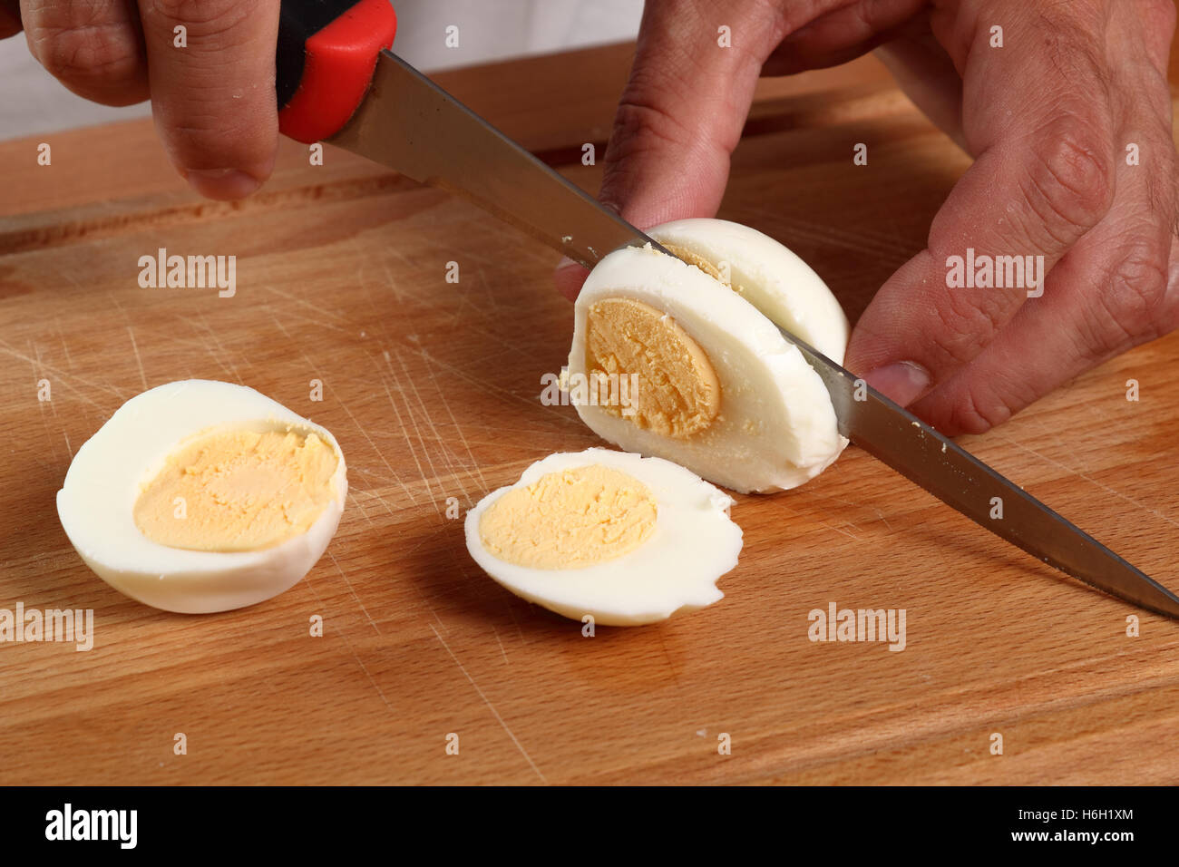 Household device for slicing eggs. Hard-boiled eggs slicer tool Stock Photo  - Alamy