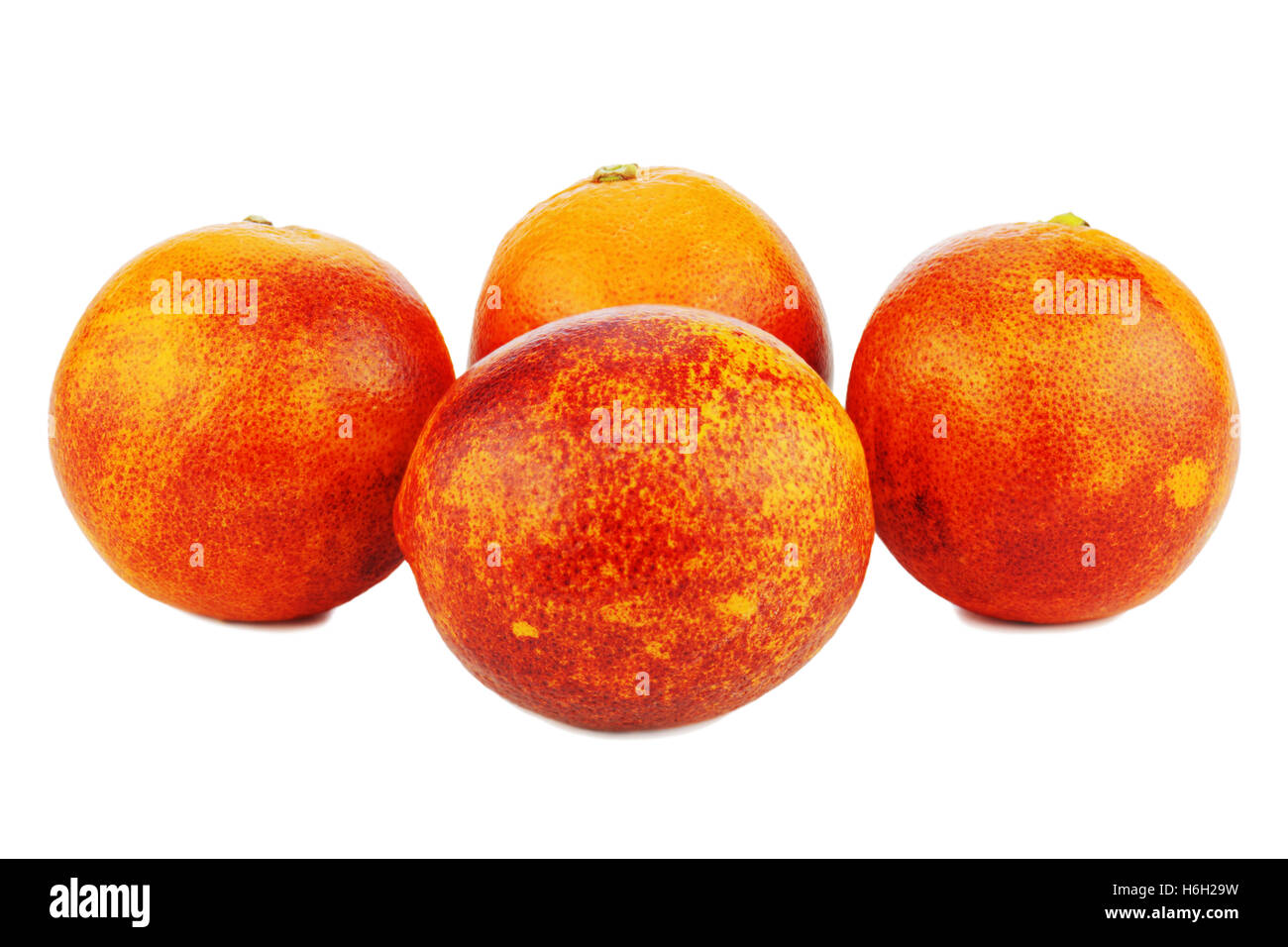 Ripe red blood oranges isolated on white background. Closeup. Stock Photo