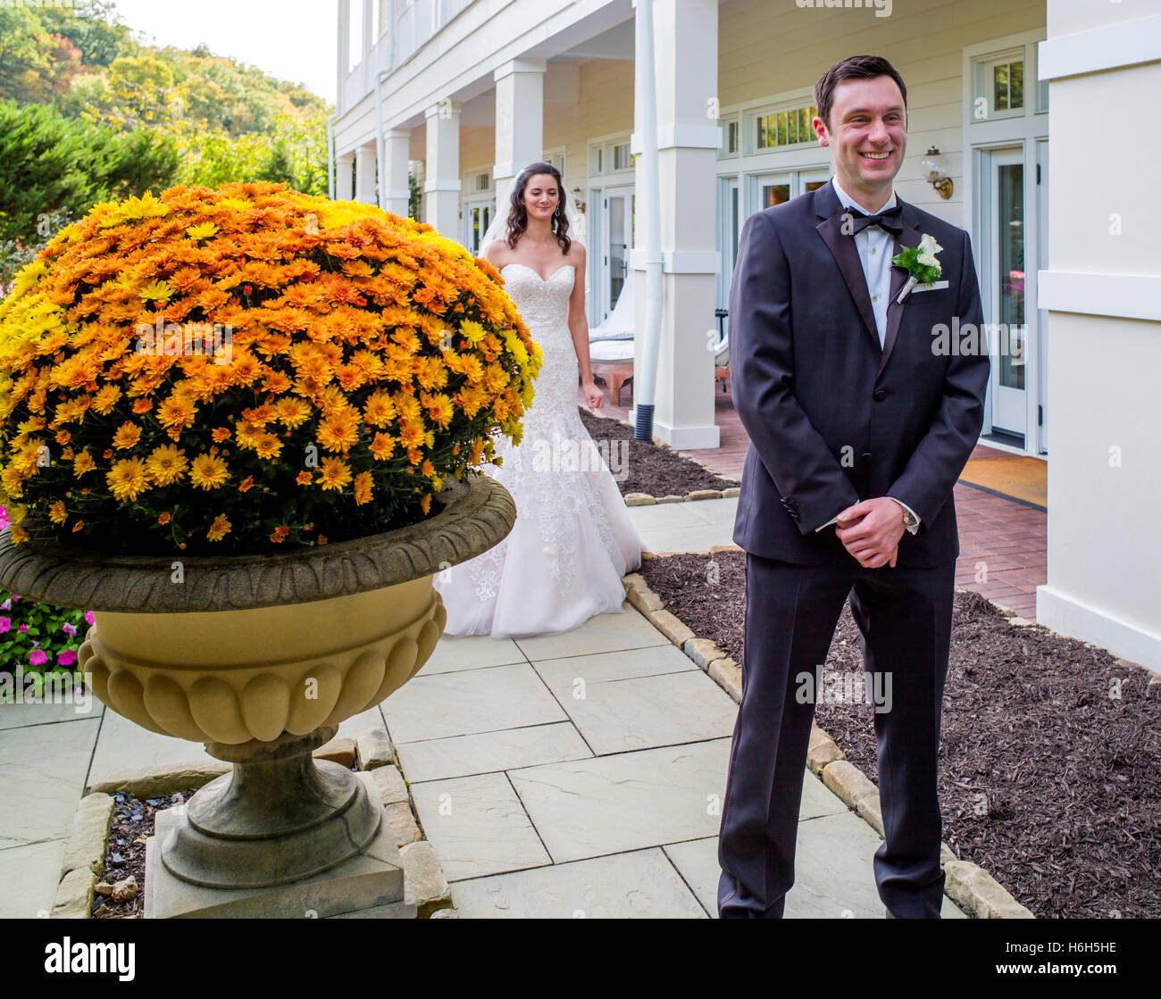 Groom waiting for arriving bride for wedding photographs; Omni Bedford Springs Resort & Spa; Bedford; Pennsylvania; USA Stock Photo