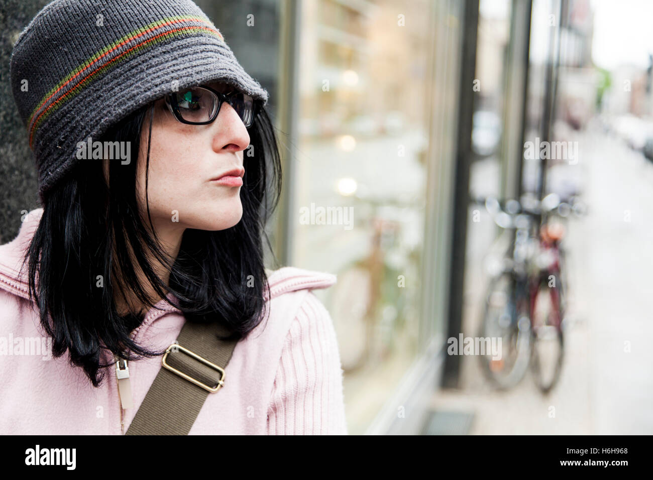 Urban portrait of a woman in her early thirties. Stock Photo