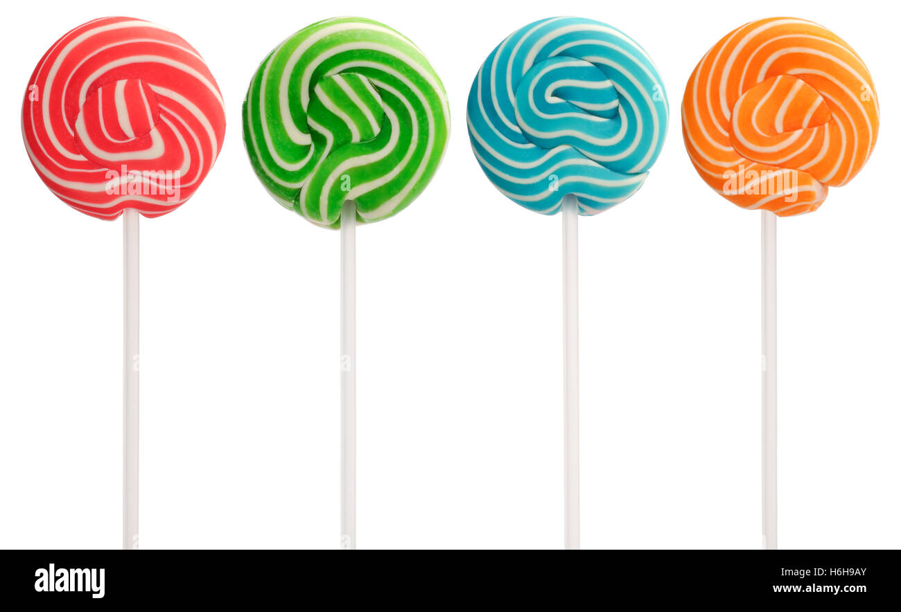 Red, green, blue and orange mini lollipops isolated on white. White swirls and white sticks. Stock Photo