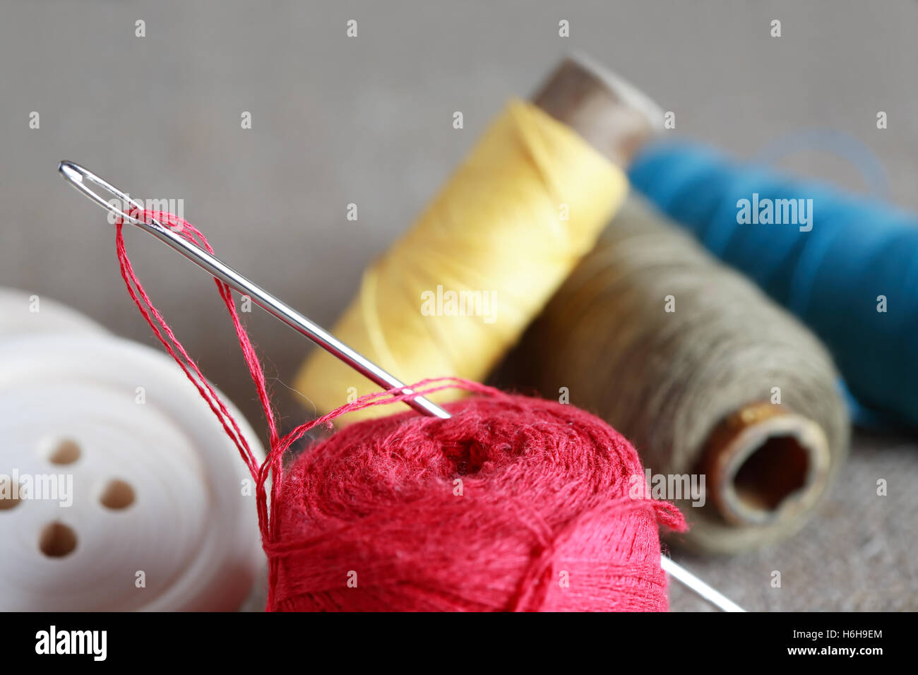 Needle and thread and buttons hires stock photography and images Alamy