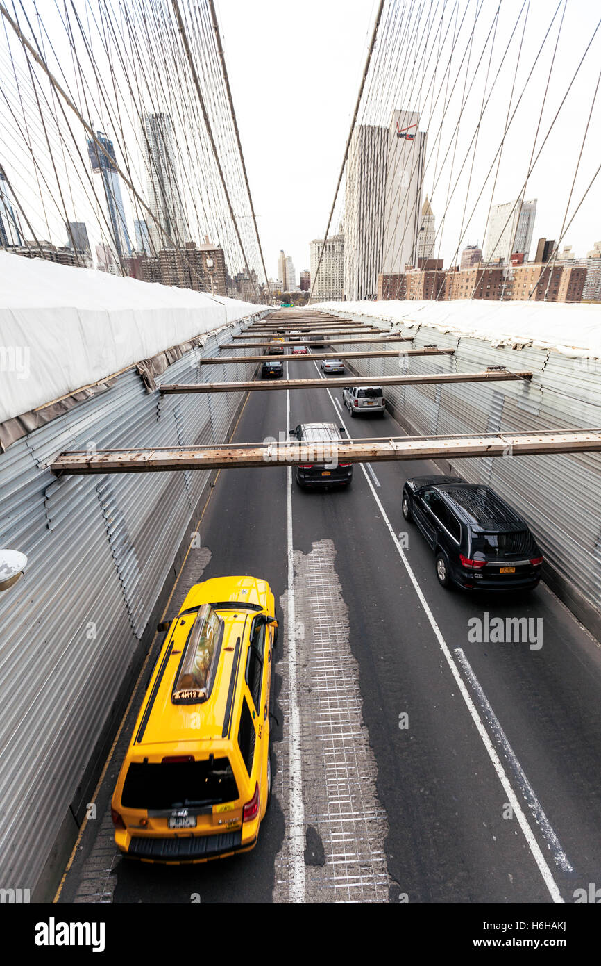 NEW-YORK - NOV 15: Afternoon rush hour traffic on the Brooklyn Bridge ...