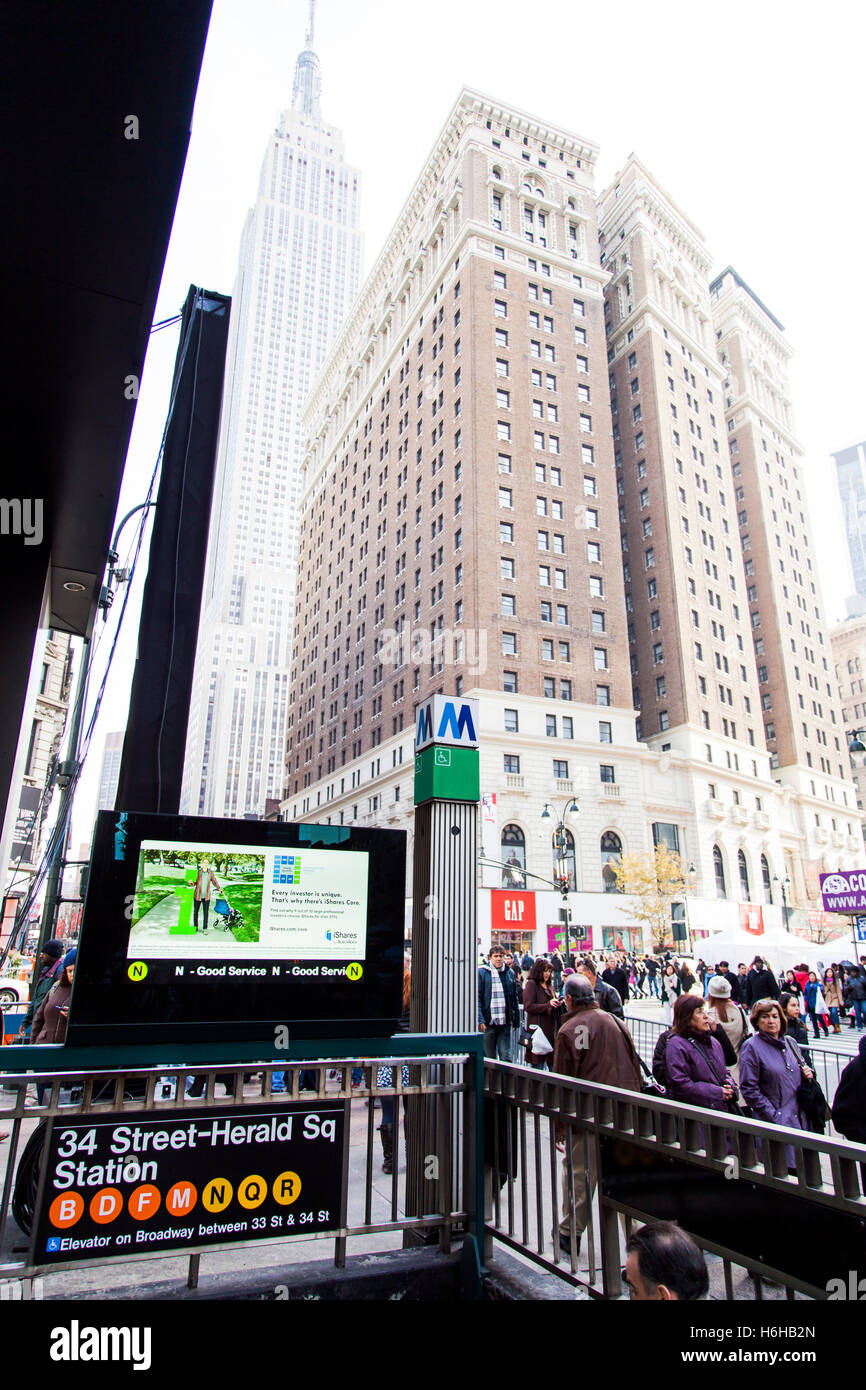 New-York, USA - NOV 20: Busy street next to entrance to the 34 st. - Herald Square subway station on November 20, 2012 in New-Yo Stock Photo