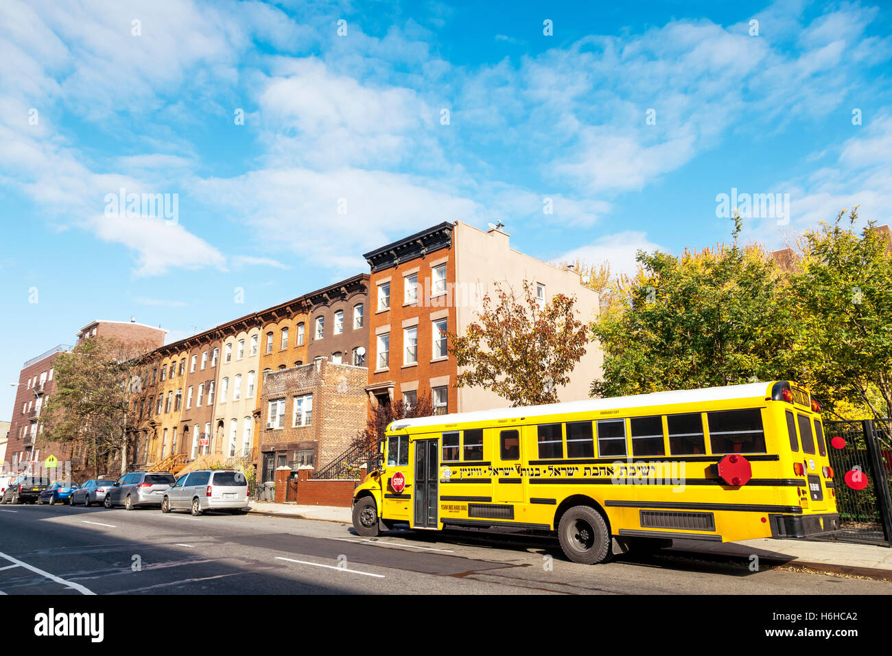 NEW-YORK - NOV 14: School bus belonging to the Ahavat Israel Yeshiva for girls parked in Brooklyn, New-York, USA on November 14, Stock Photo