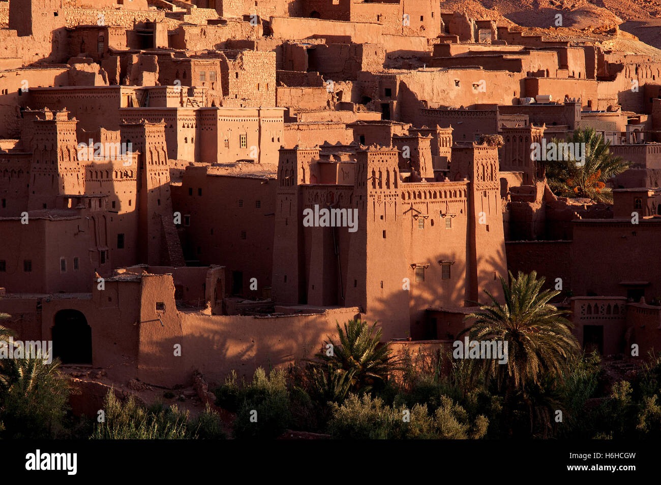 Ait Benhaddou, Morocco: the fortified town or ksar, a world heritage site, lit up at sunrise in Morocco's arid Atlas Mountains. Stock Photo