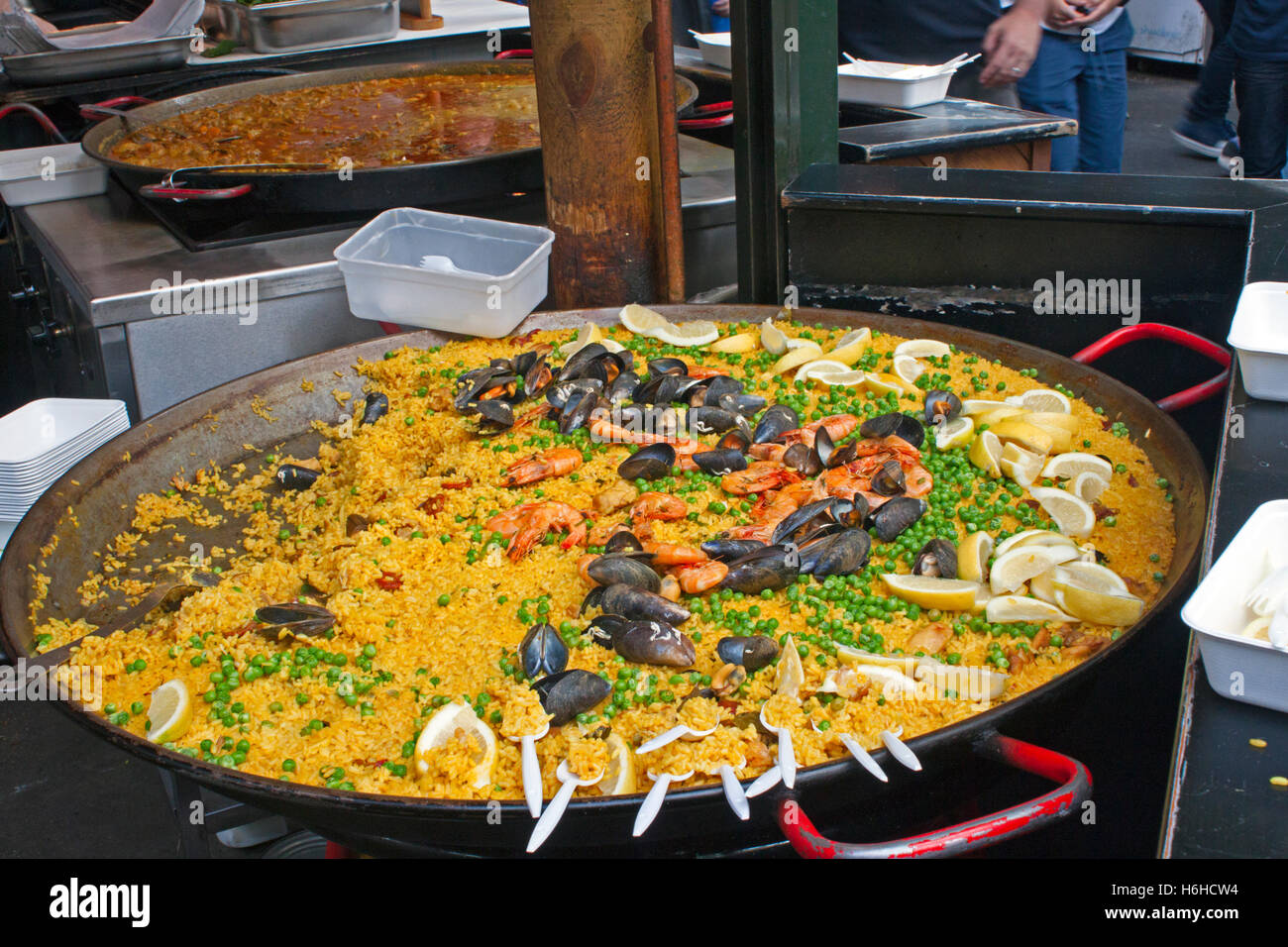 A large pan of paella on a stall in Borough Market in Southwark near London Bridge Stock Photo