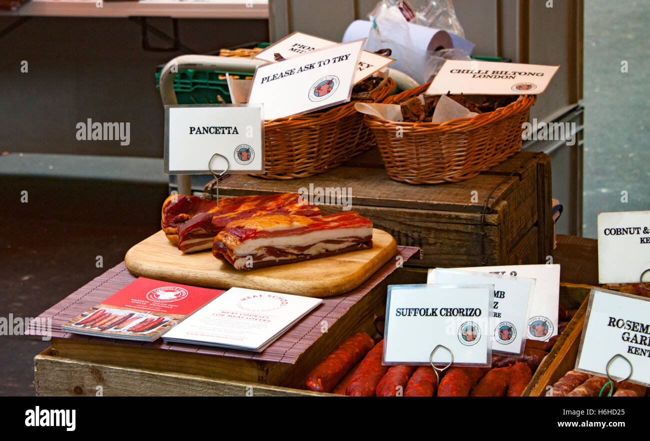 Continental Sausage And Bacon Stall In Borough Market In Southwark Near London Bridge Stock