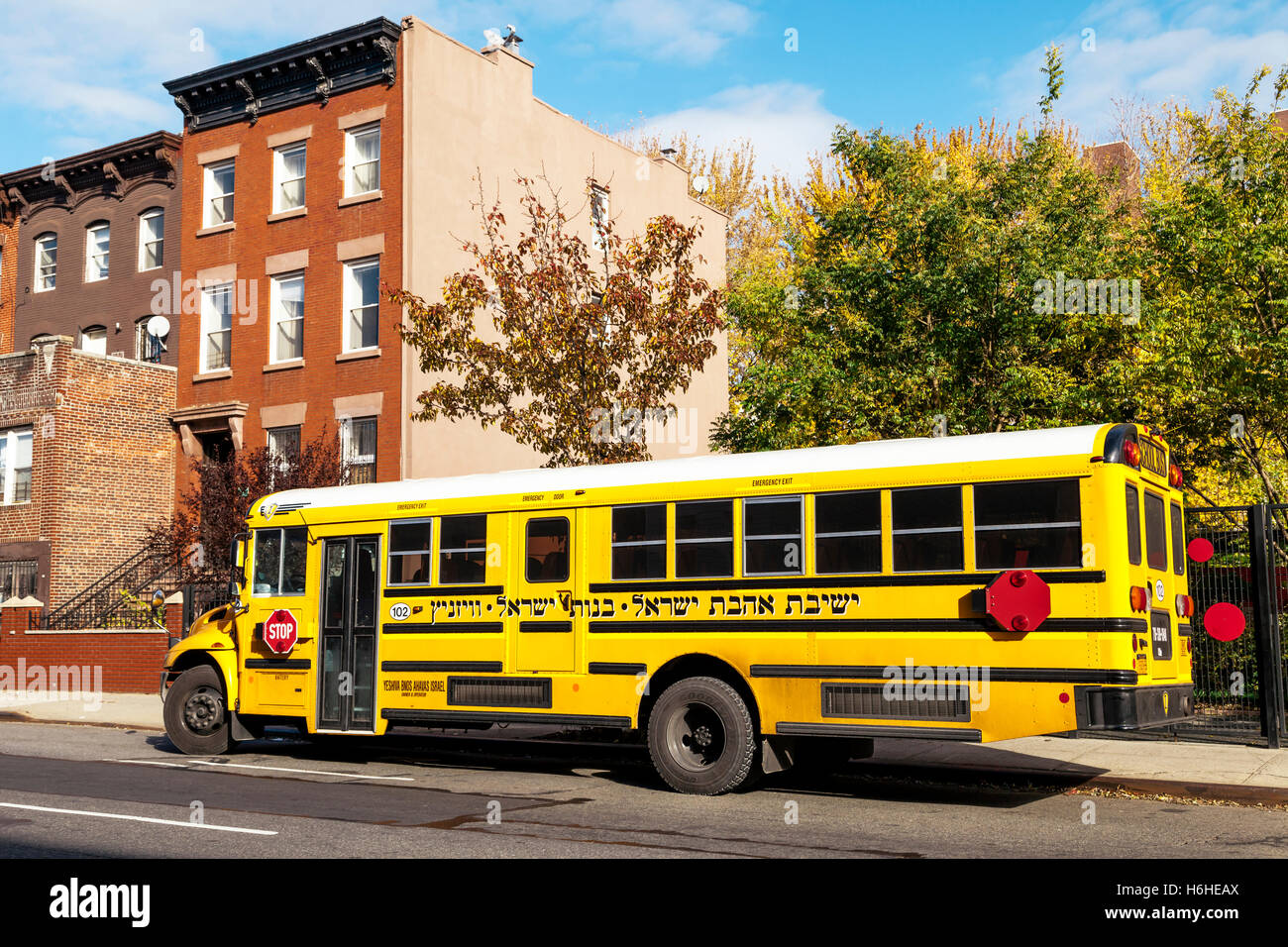 NEW-YORK - NOV 14: School bus belonging to the Ahavat Israel Yeshiva for girls parked in Brooklyn, New-York, USA on November 14, Stock Photo