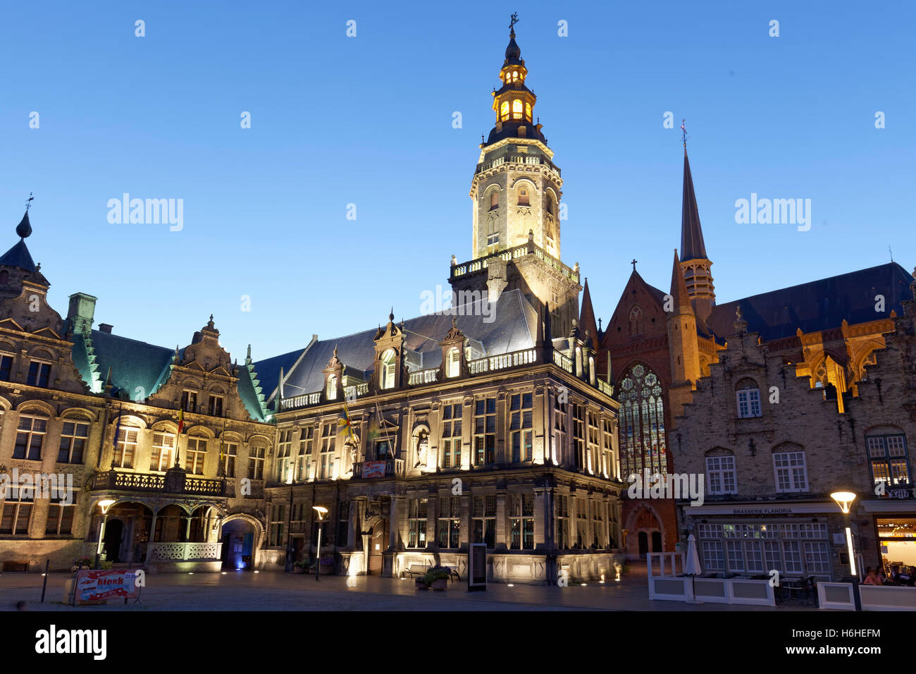 City Hall, Palace of Justice, and Belfry Sint-Walburgakerk at The Great Market Square of Veurne, at twilight Stock Photo