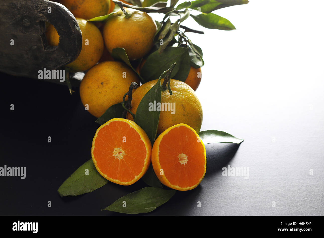 mandarin fruit isolate black Stock Photo Alamy