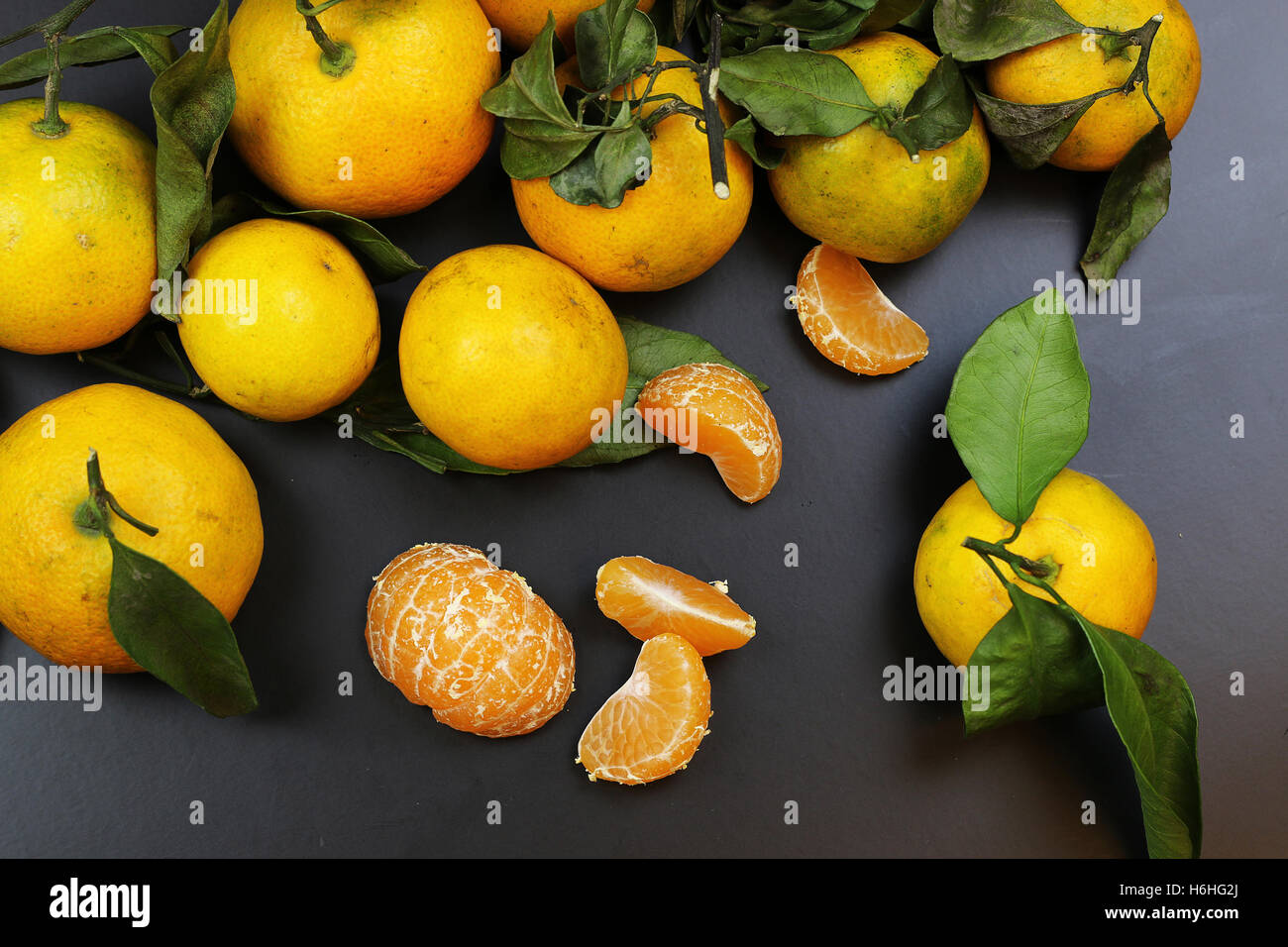 mandarin fruit isolate black Stock Photo Alamy