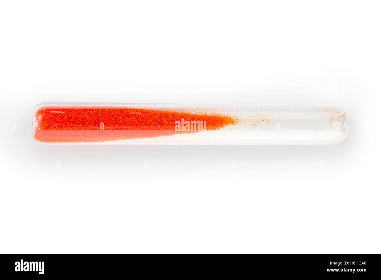 Vacuum sealed ampule with a red substance. Vial with dangerous chemical or chemical component concept. Stock Photo