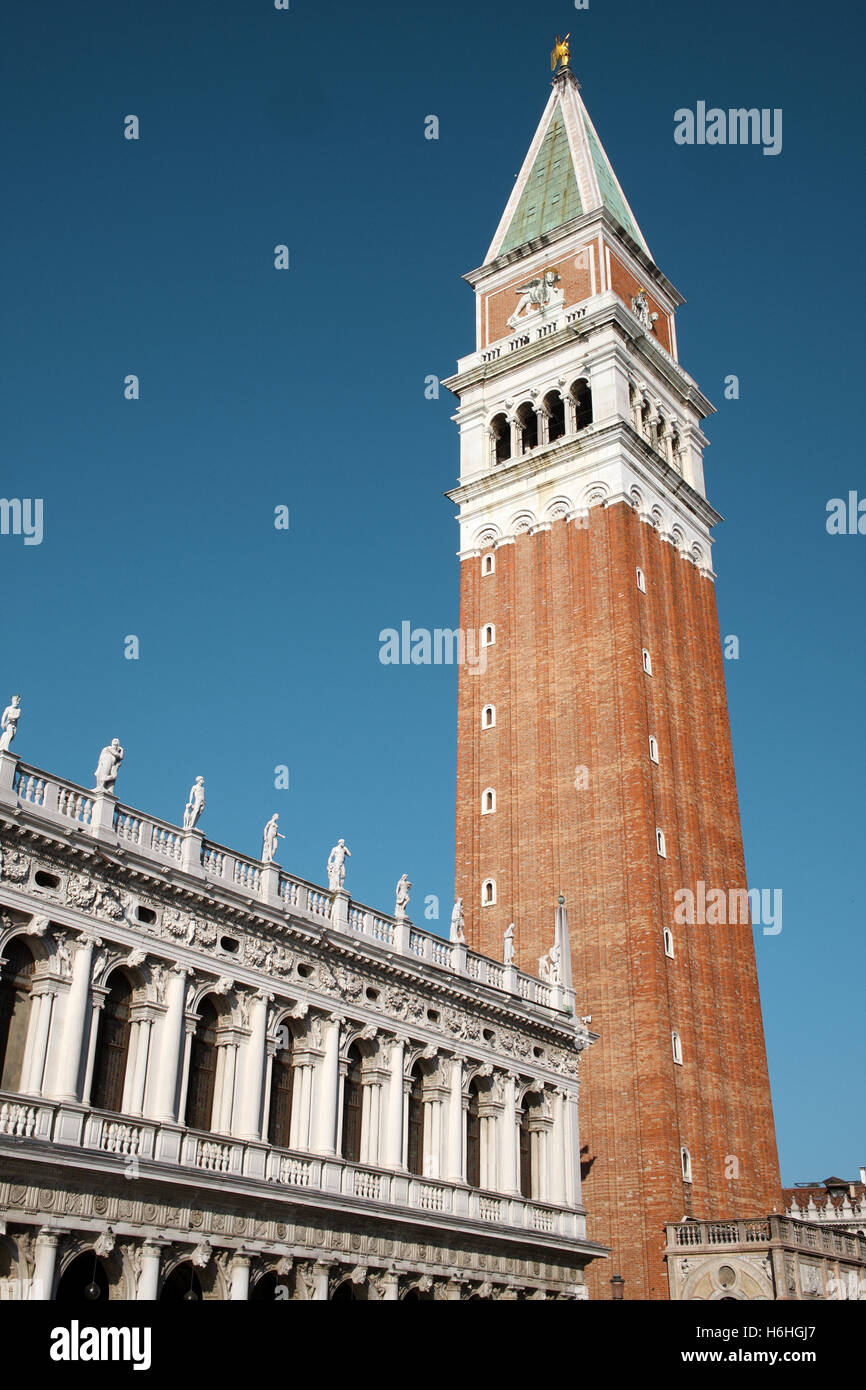 The towering St Mark's Campanile in the Piazza San Marco Venice Italy Stock Photo
