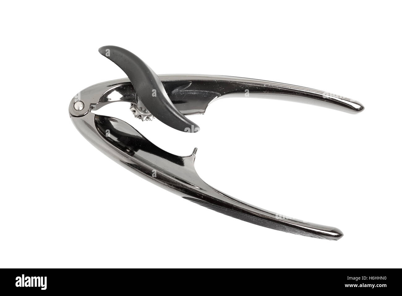 Modern opener with combination of rotating cutting wheel and serrated wheel. Isolated with clipping path. Stock Photo
