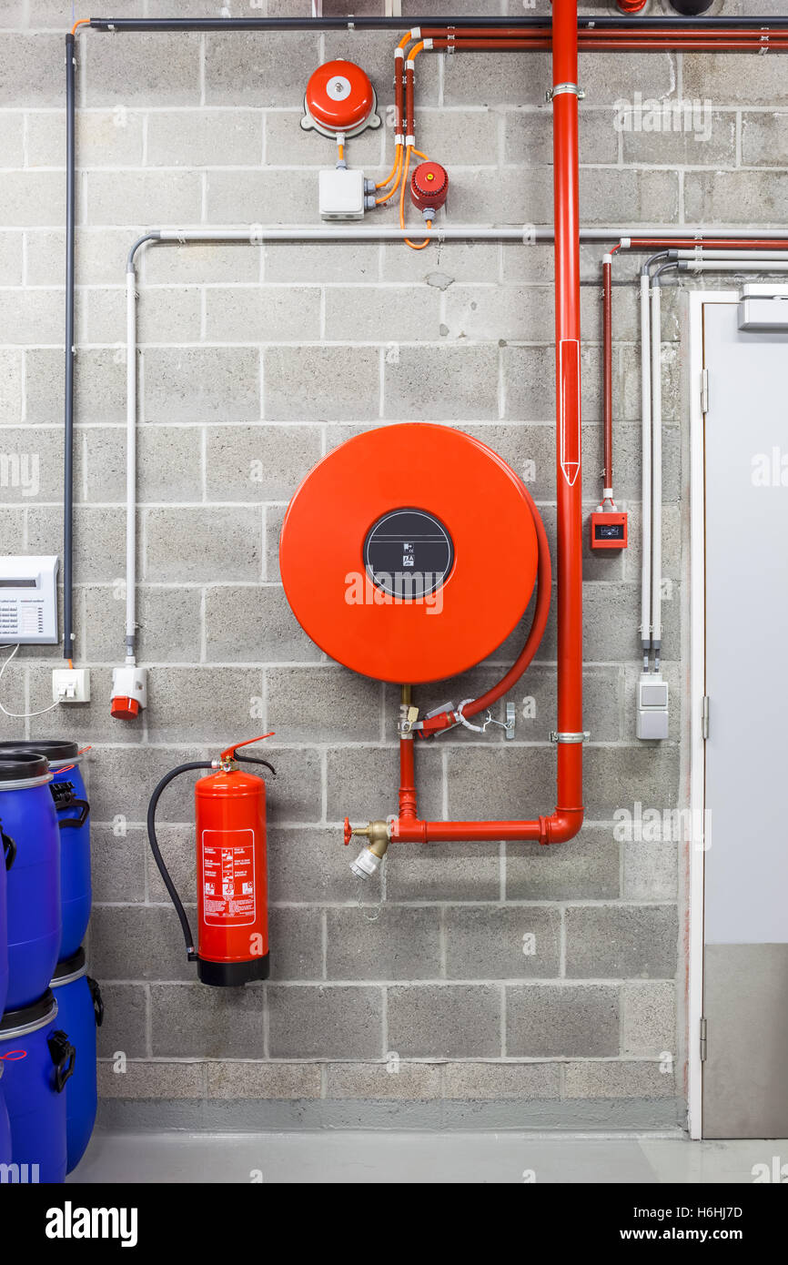 Hose reel wall with ANSUL fire hose - Fire extinguishers 