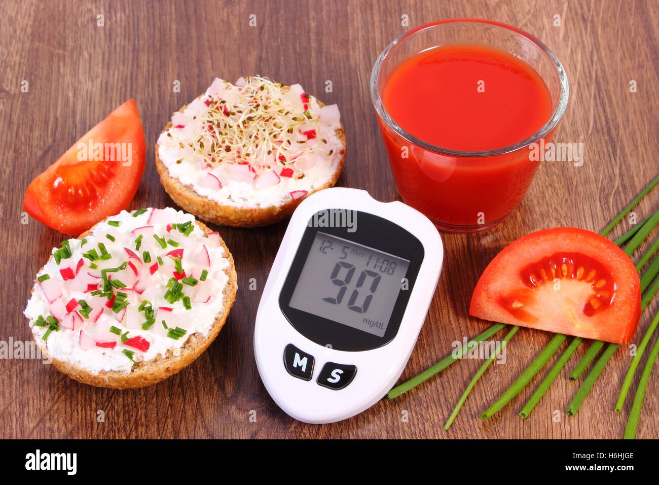 Glucose meter, freshly prepared vegetarian sandwich with cottage cheese