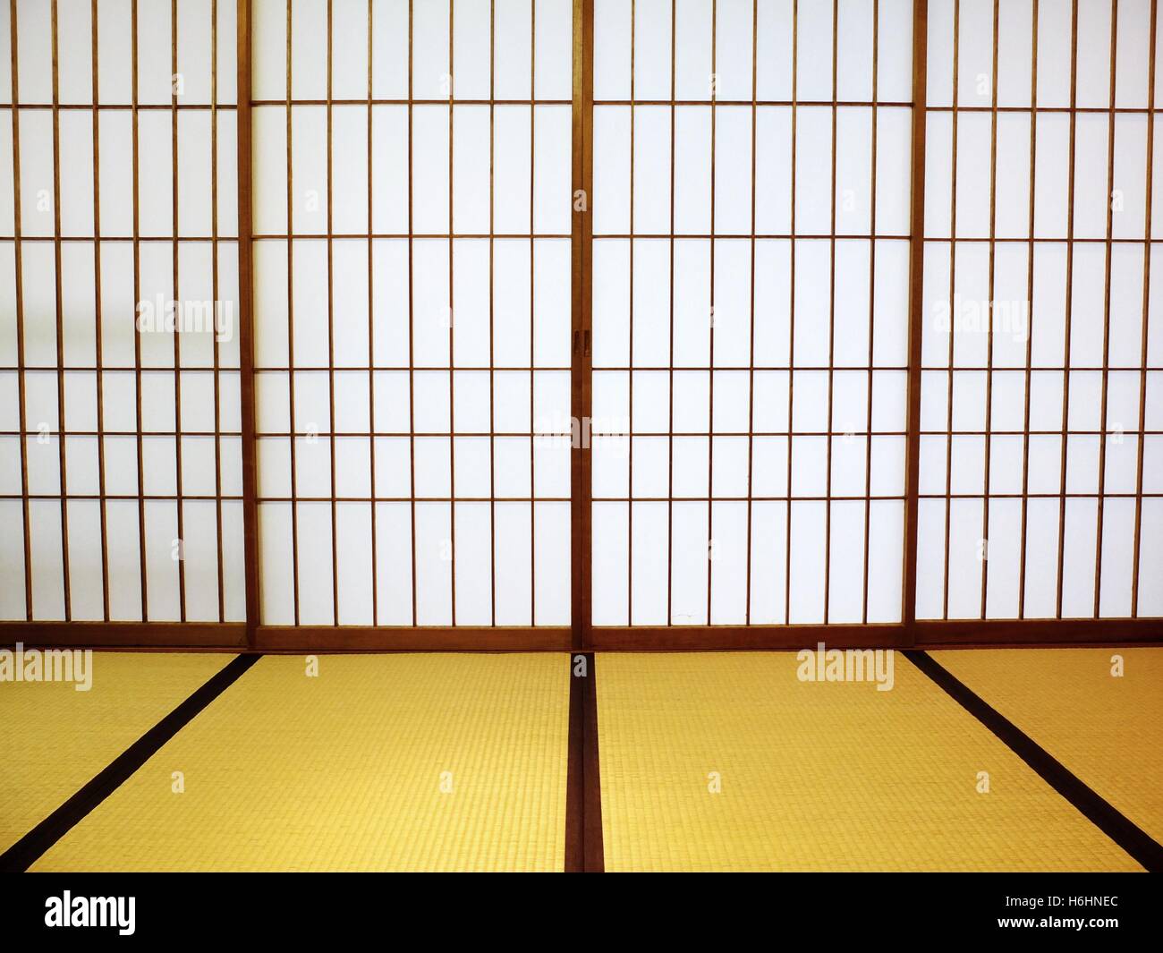 Tatami room with shoji sliding doors. Empty background. Stock Photo