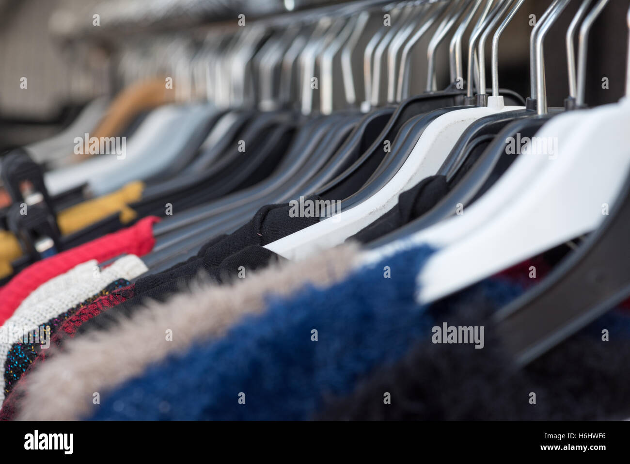 Clothe Hanging on Hangers in a Shop Window Geneva, Switzerland Stock