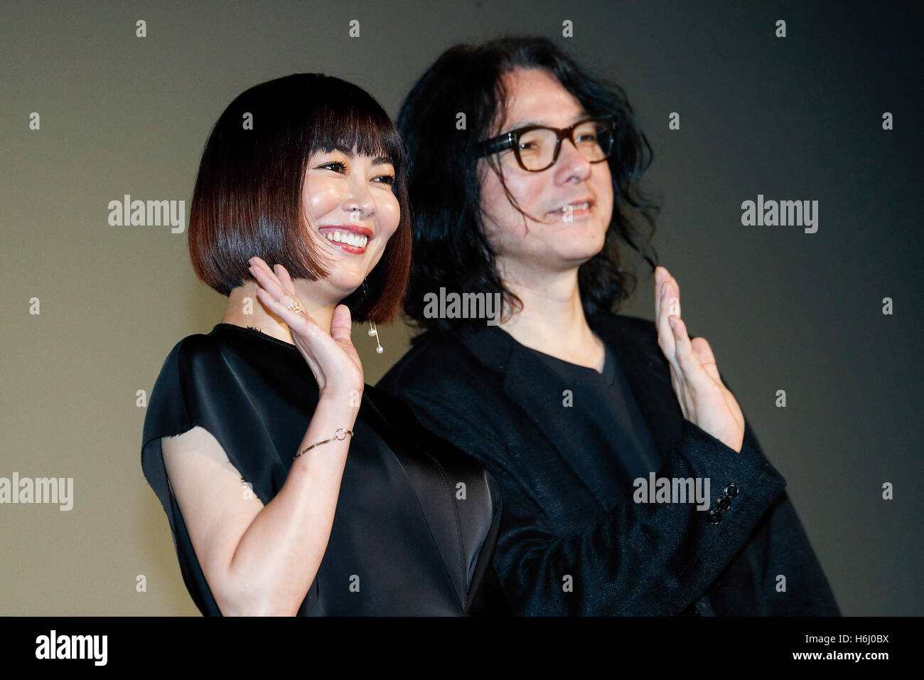 L To R Actress Miho Nakayama And Director Shunji Iwai Pose For The Cameras During A Stage Greeting For The Film Love Letter At Toho Cinemas In Roppongi Hills On October 28