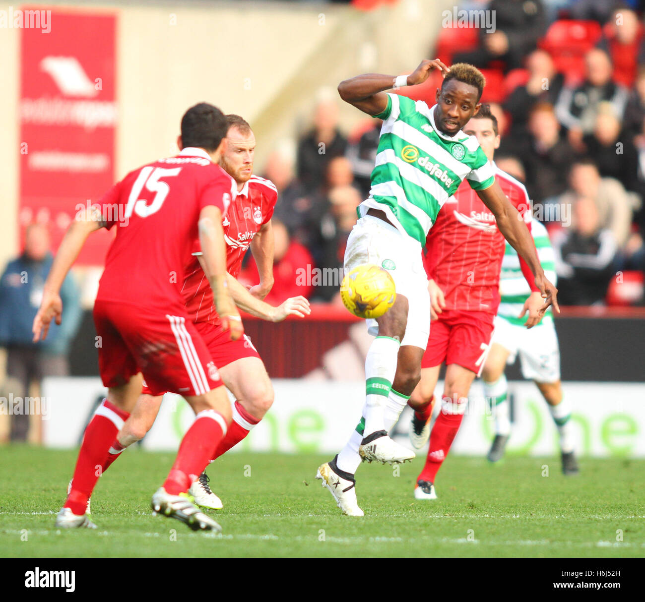 Pittodrie Stadium, Aberdeen, Scotland. 29th Oct, 2016. Scottish Premier League Football. Aberdeen versus Celtic. Moussa Dembele brings the ball away from Mark Reynolds Credit:  Action Plus Sports/Alamy Live News Stock Photo