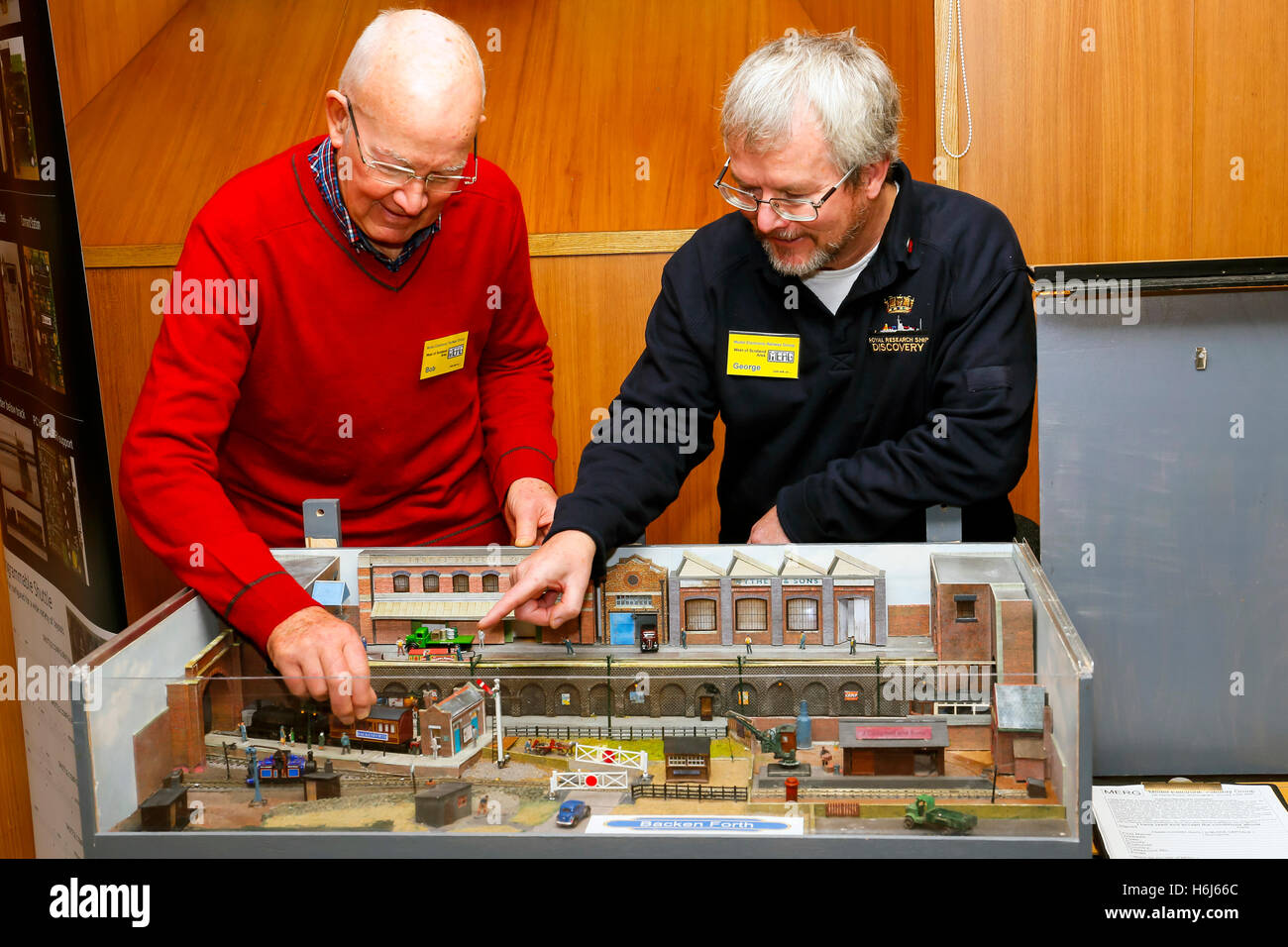 Glasgow, Scotland, UK. 29th October, 2016. On the opening day, of the two day annual Cathcart Model Railway more than a thousand model railway enthusiasts, with ages ranging from 18 months to 100 years old, came to view the railway layouts in various guages and era.GEORGE PARKINSON and BOB YOUNG from the Model Electronic Raiulway Group examines and 'N' guage layout. Credit:  Findlay/Alamy Live News Stock Photo