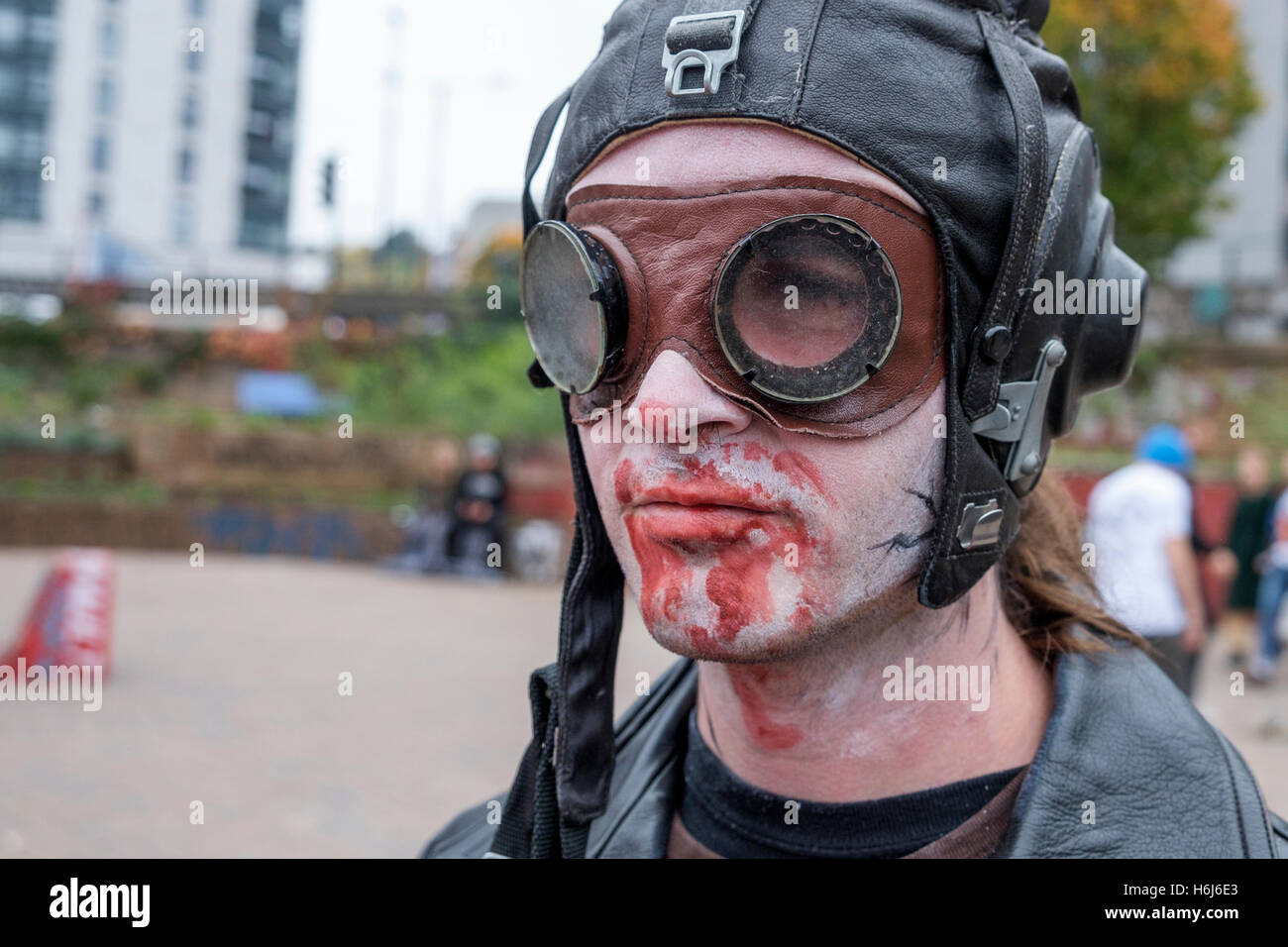 Bristol, UK. 29th Oct, 2016. A man in fancy dress poses for a photograph as he participates in a Zombie Walk In Bristol. Credit:  lynchpics/Alamy Live News Stock Photo