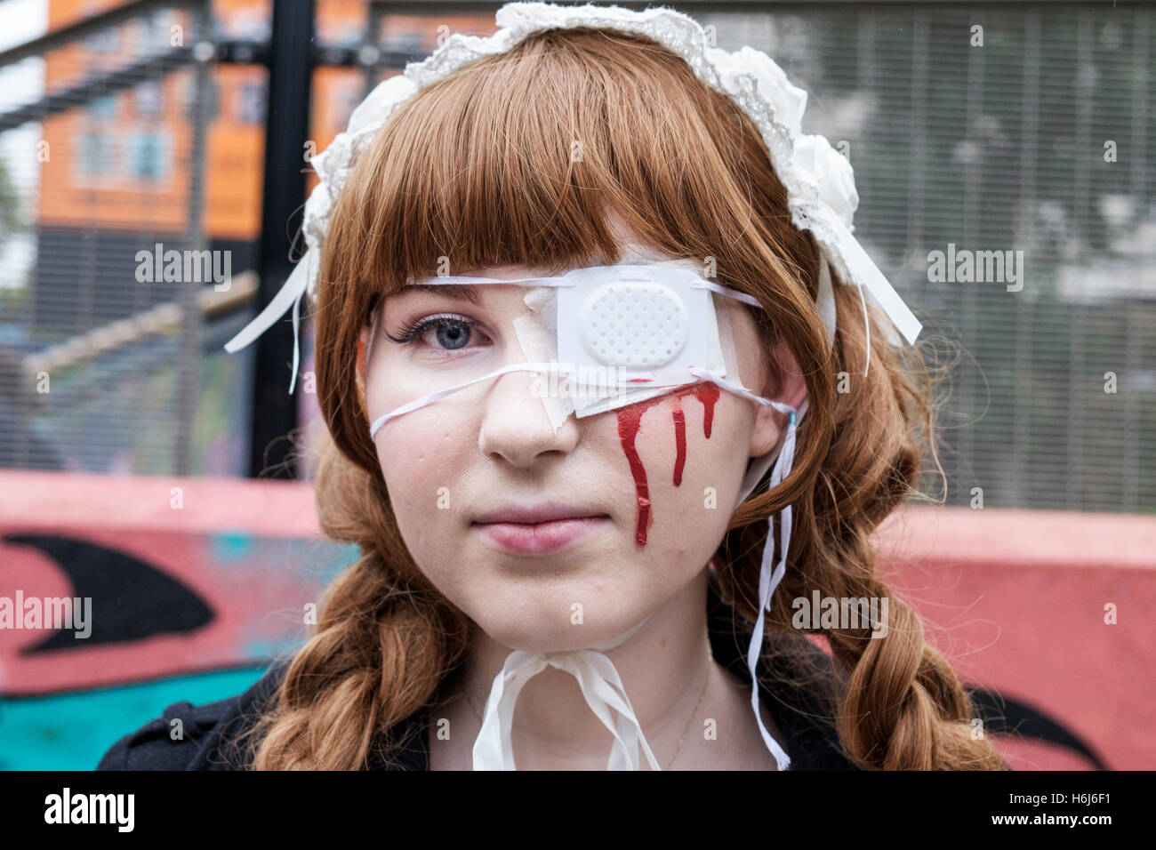 Bristol, UK. 29th Oct, 2016. A woman in fancy dress poses for a photograph as she participates in a Zombie Walk In Bristol. Credit:  lynchpics/Alamy Live News Stock Photo