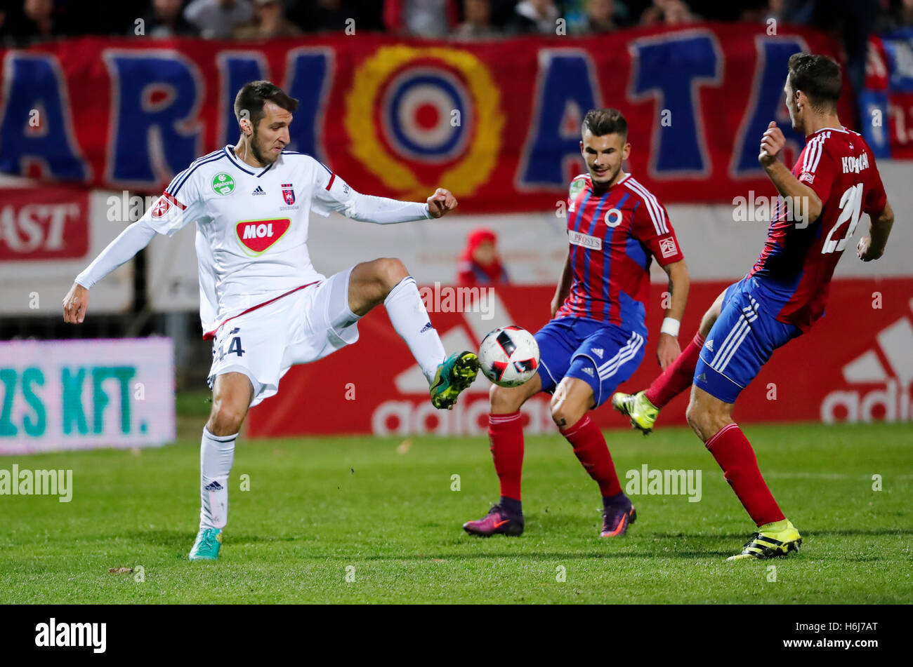 Budapest, Hungary. 29th October, 2016. Marko Scepovic #44 of Videoton FC  competes for the ball with Zsolt Korcsmar #21 of Vasas FC and Szilveszter  Hangya (M) of Vasas FC during the Hungarian