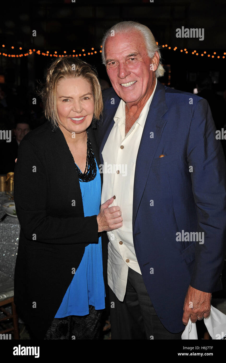Hollywood FL, USA. 28th Oct, 2016. Lesley Visser and Robert Kanuth attend Footy's Bubbles & Bones Gala held at the Western Diplomat on October 28, 2016 in Hollywood, Florida. © Mpi04/Media Punch/Alamy Live News Stock Photo