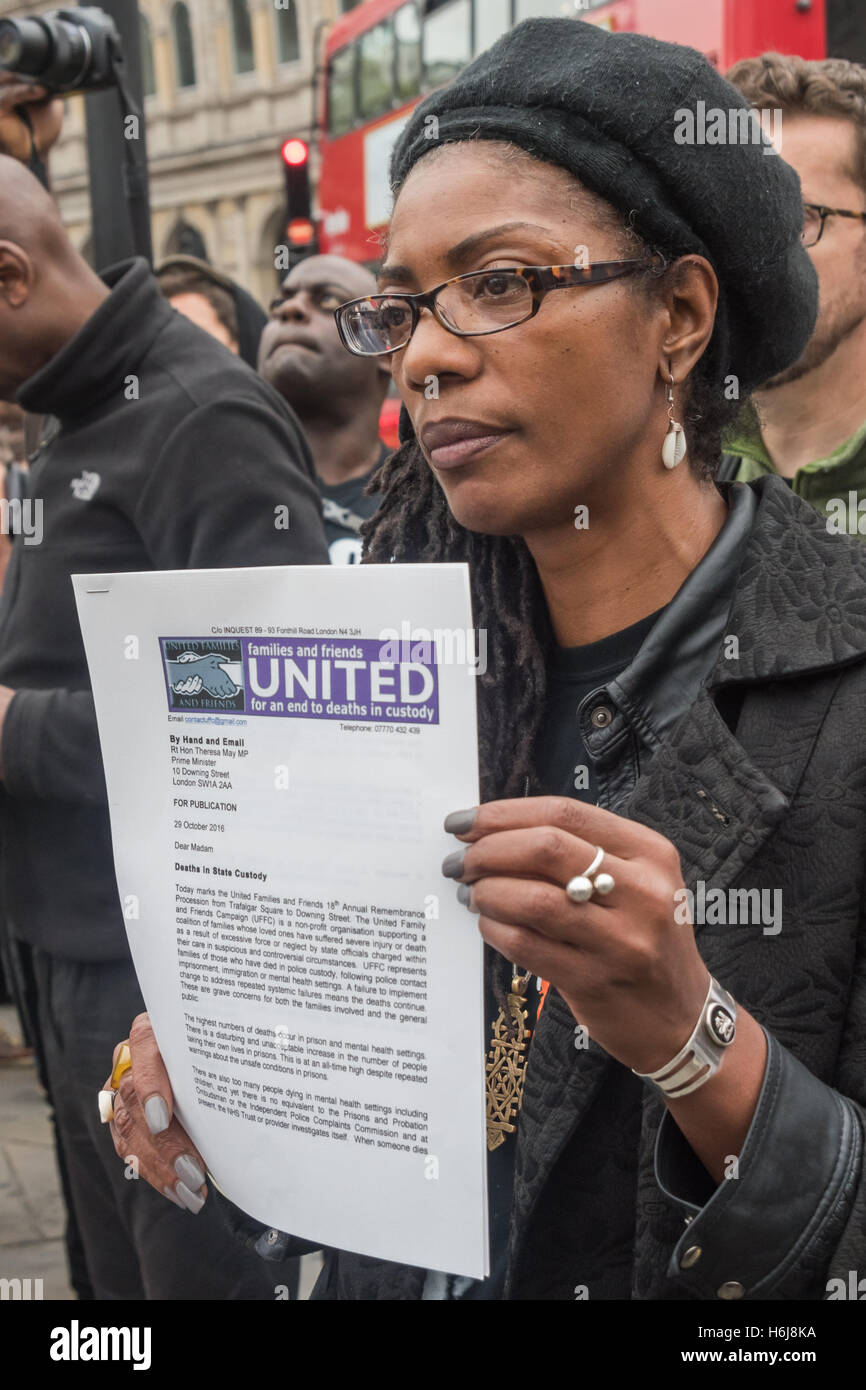 London, UK. 29th October 2016. Marcia Rigg, whose borther Sean was killed by police in Brixton police station in 2008 holds up a copy of the letter whichThe Families and friends of people killed by police or in prisons are going to deliver to Theresa May. Peter Marshall/Alamy Live News Stock Photo