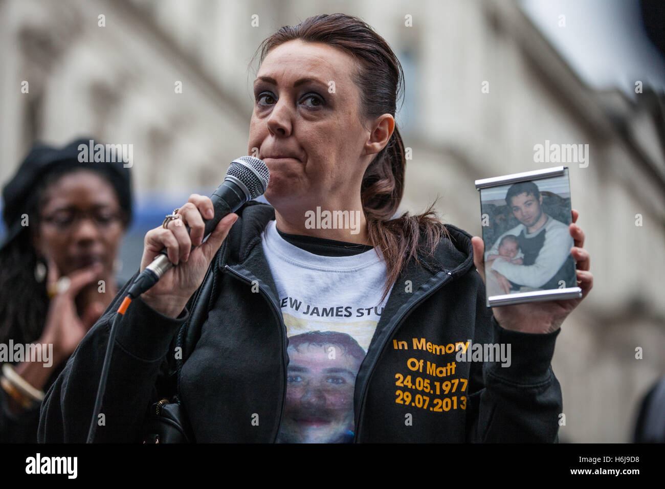 London, UK. 29th October, 2016. Jenny Collingwood-Stubbs, sister of Matthew Stubbs, addresses campaigners from the United Families and Friends Campaign (UFFC) outside Downing Street following their annual procession. Matthew Stubbs, 36, died on 29th July 2013 after being found hanging in his cell at HMP Leeds three days earlier. Credit:  Mark Kerrison/Alamy Live News Stock Photo