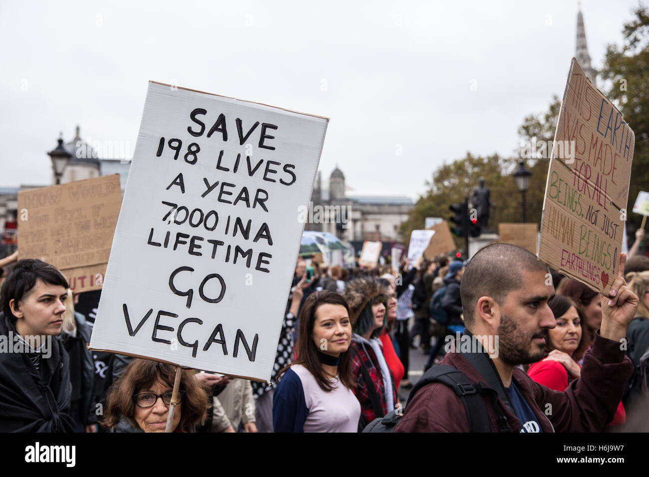 London, UK. 29th October, 2016. Animal rights activists march through Trafalgar Square en route to Parliament to demand that politicians and companies end the exploitation and killing of animals for the benefit of human beings. The march was organised by creative activism collective Surge. Stock Photo