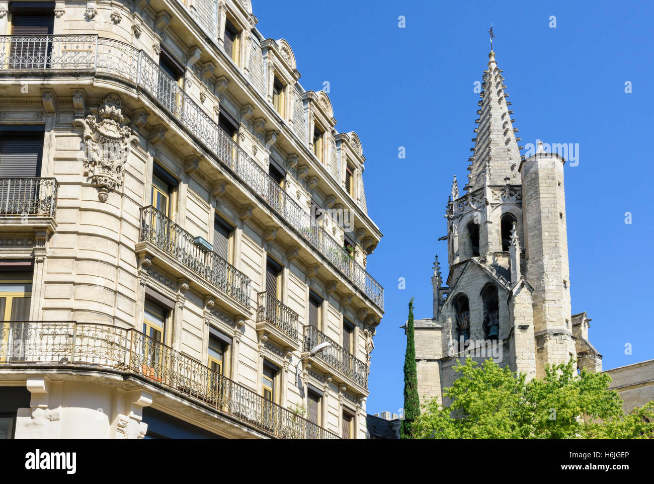 Basilique Saint-Pierre, and balconied building in Place Carnot, Avignon, France Stock Photo