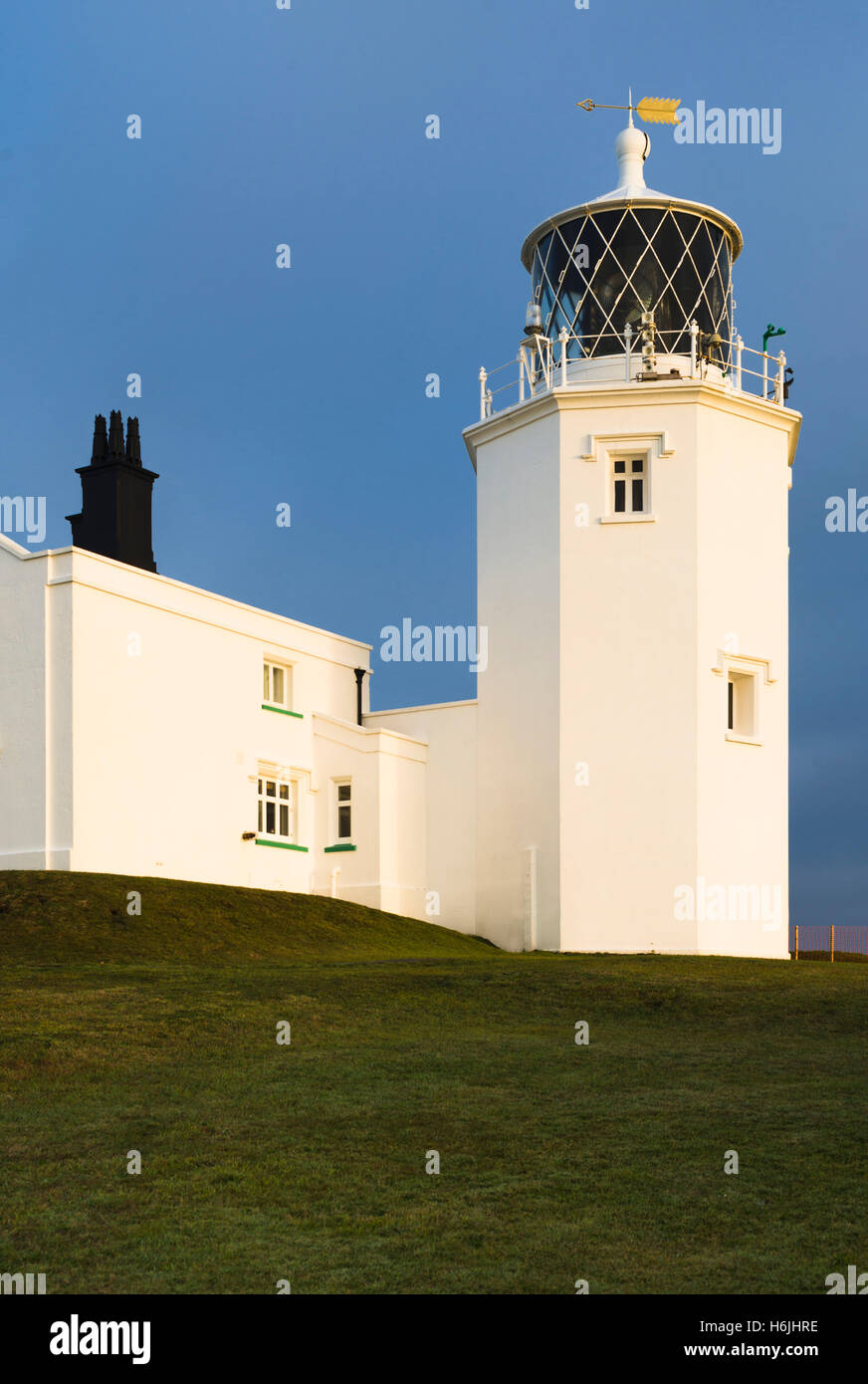 Lizard Point Lighthouse tower at southernmost cape of Great Britain Lizard Point, Cornwall, England at sunrise Stock Photo