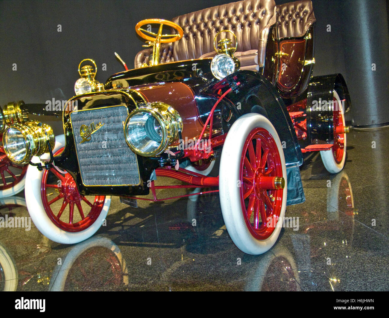 Cadillac Vintage 1900's car with red spoke wheels and white tyres Stock Photo