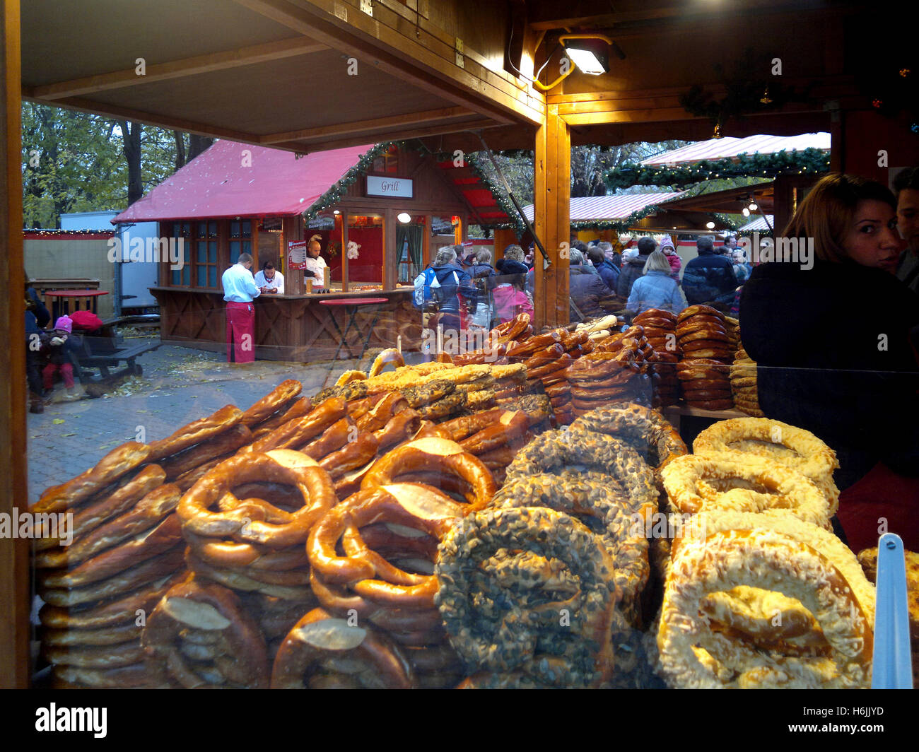 Vendor selling pretzels at Berlin Alexanderplatz Christmas Market Stock